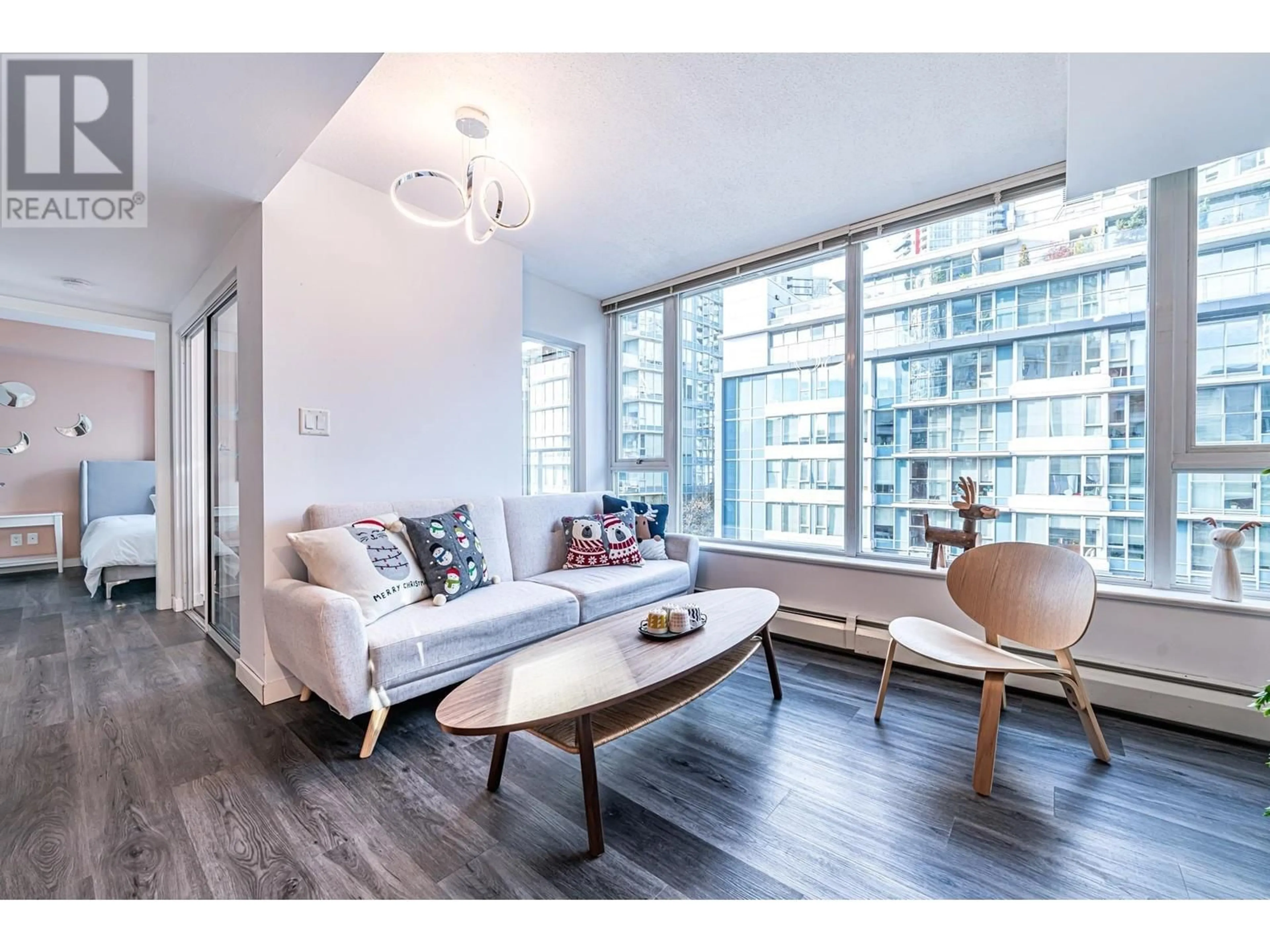 Living room with furniture, wood/laminate floor for 607 - 618 ABBOTT STREET, Vancouver British Columbia V6B0C1