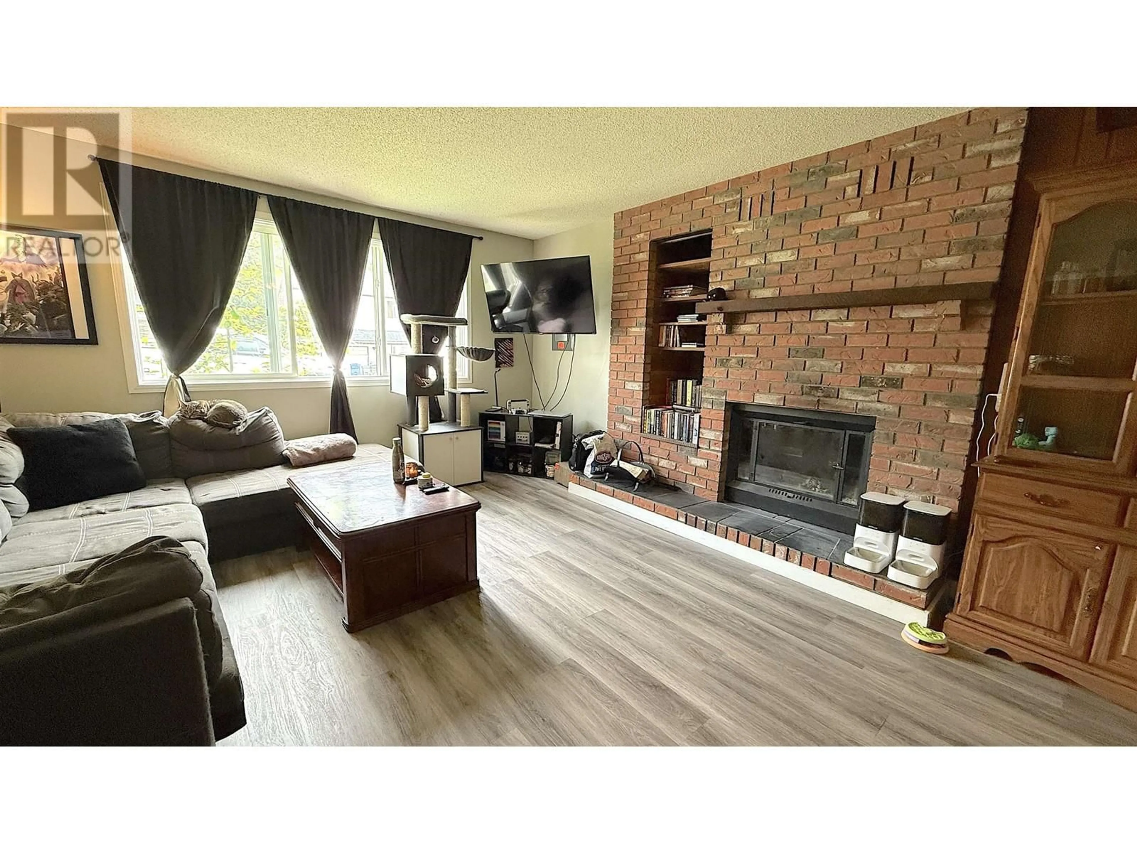 Living room with furniture, wood/laminate floor for 1798 SLOAN AVENUE, Prince Rupert British Columbia V8J4B5