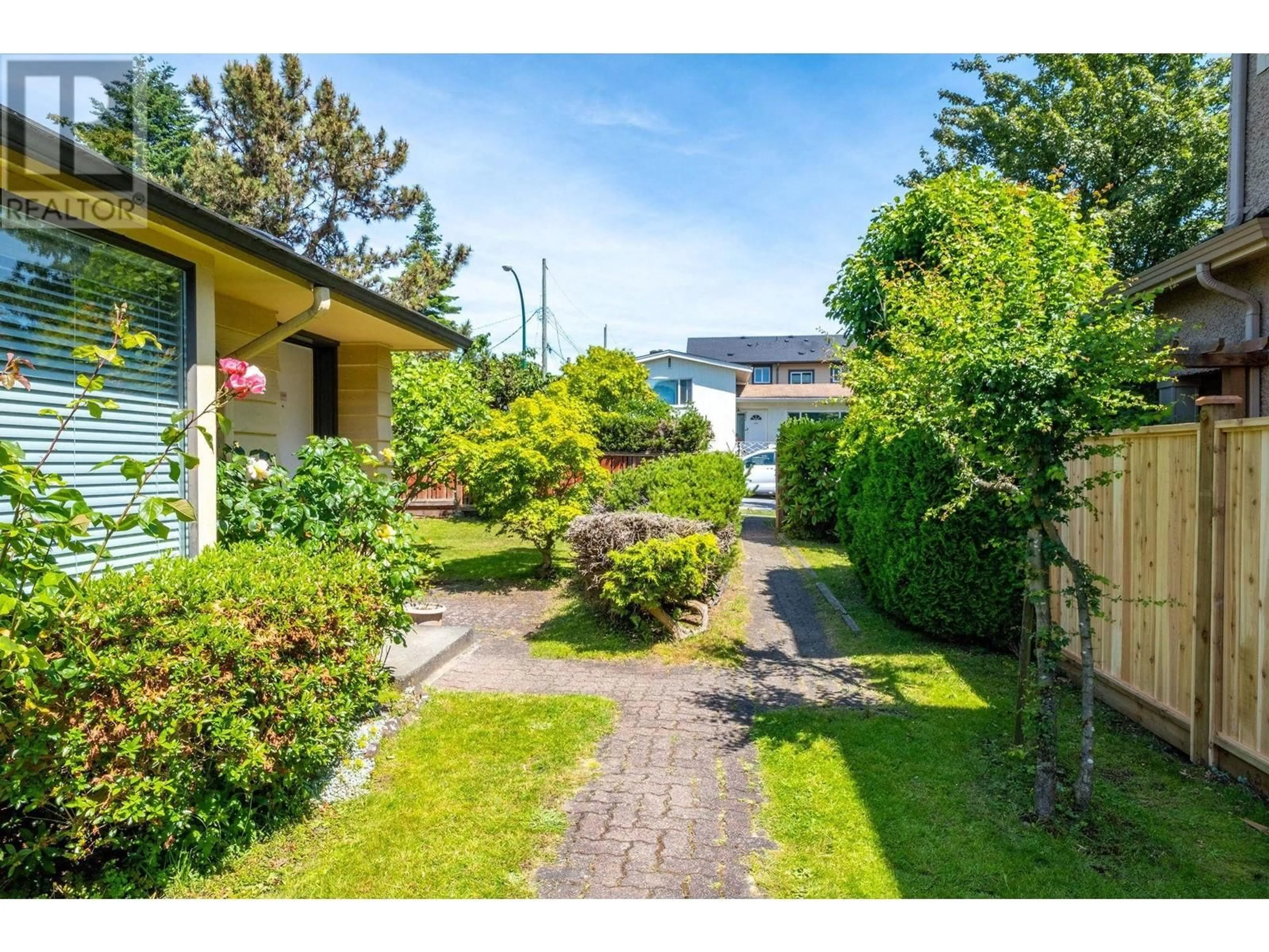 A pic from outside/outdoor area/front of a property/back of a property/a pic from drone, street for 8271 LAUREL STREET, Vancouver British Columbia V6P3V2