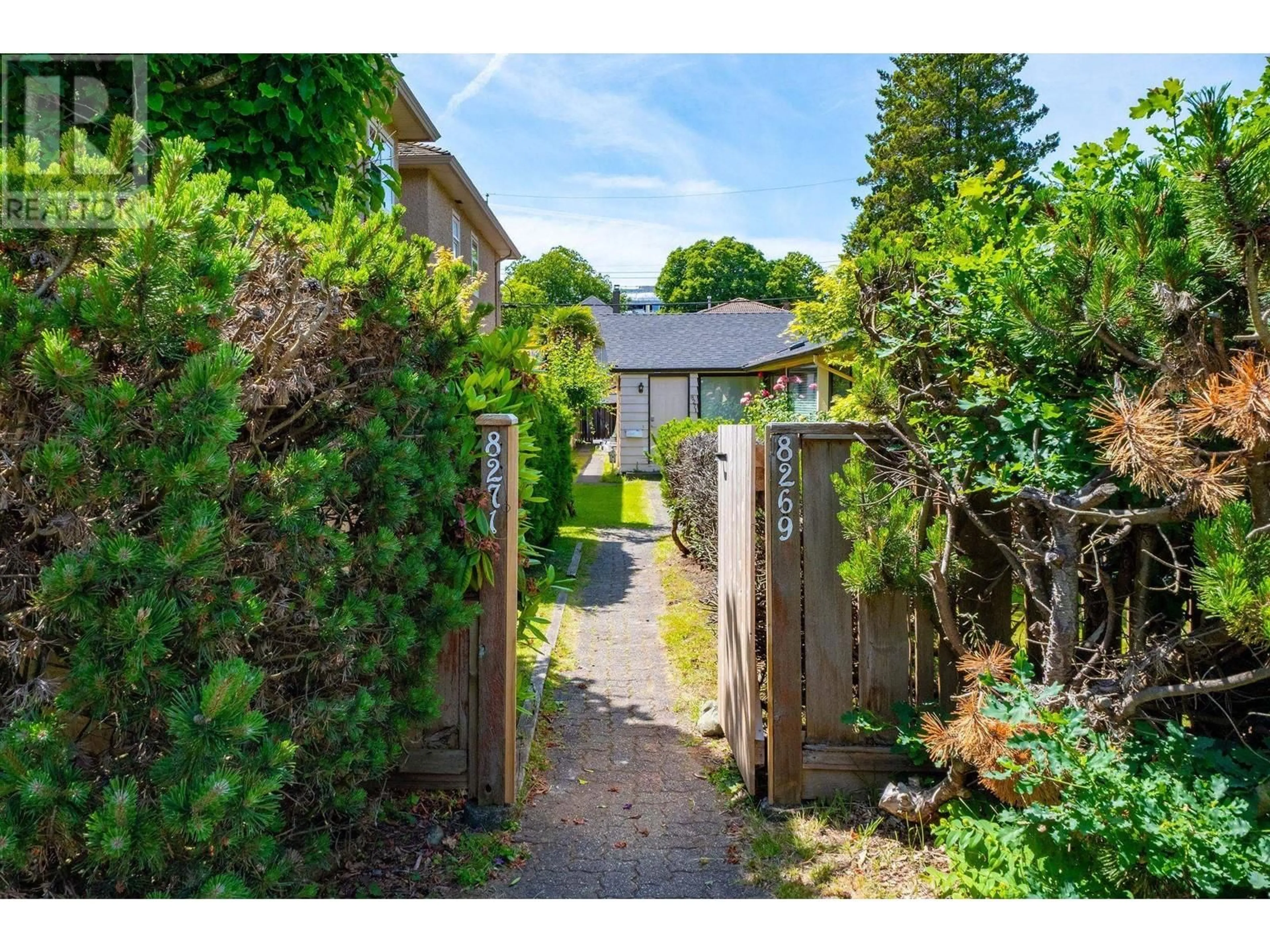 A pic from outside/outdoor area/front of a property/back of a property/a pic from drone, street for 8271 LAUREL STREET, Vancouver British Columbia V6P3V2