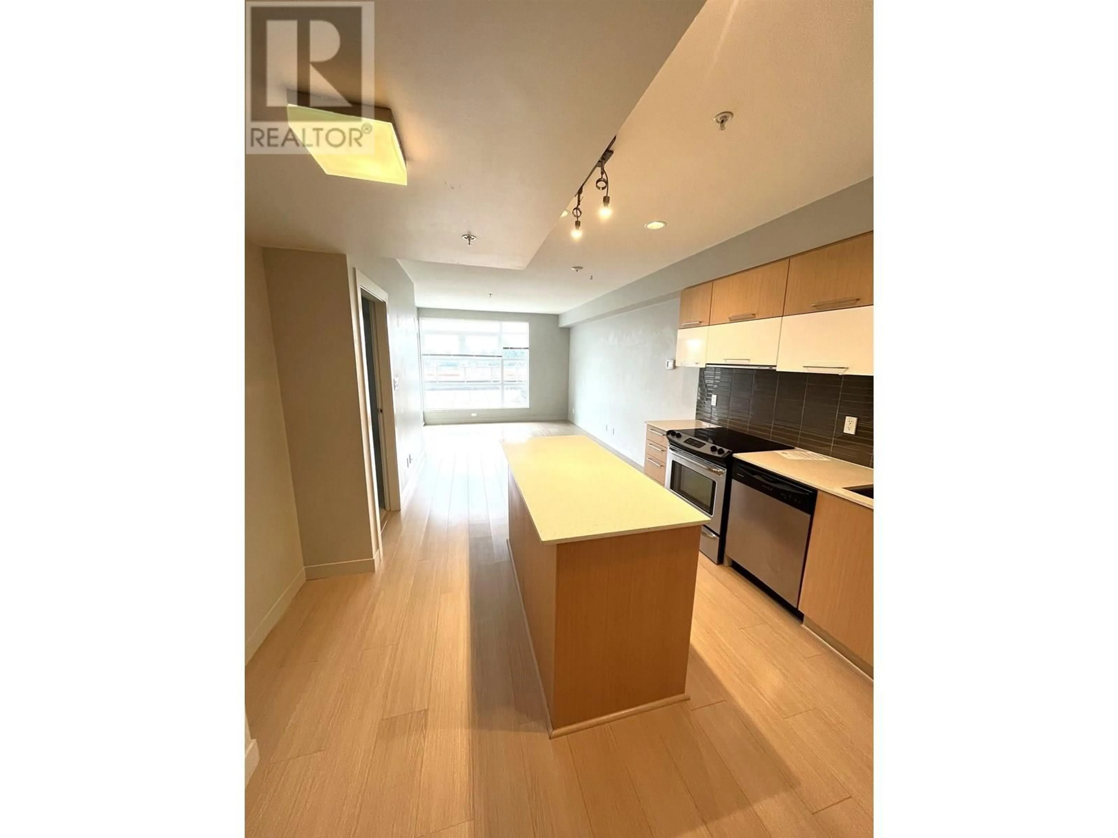 Open concept kitchen, wood/laminate floor for 317 - 10020 DUNOON DRIVE, Richmond British Columbia V7A0A7
