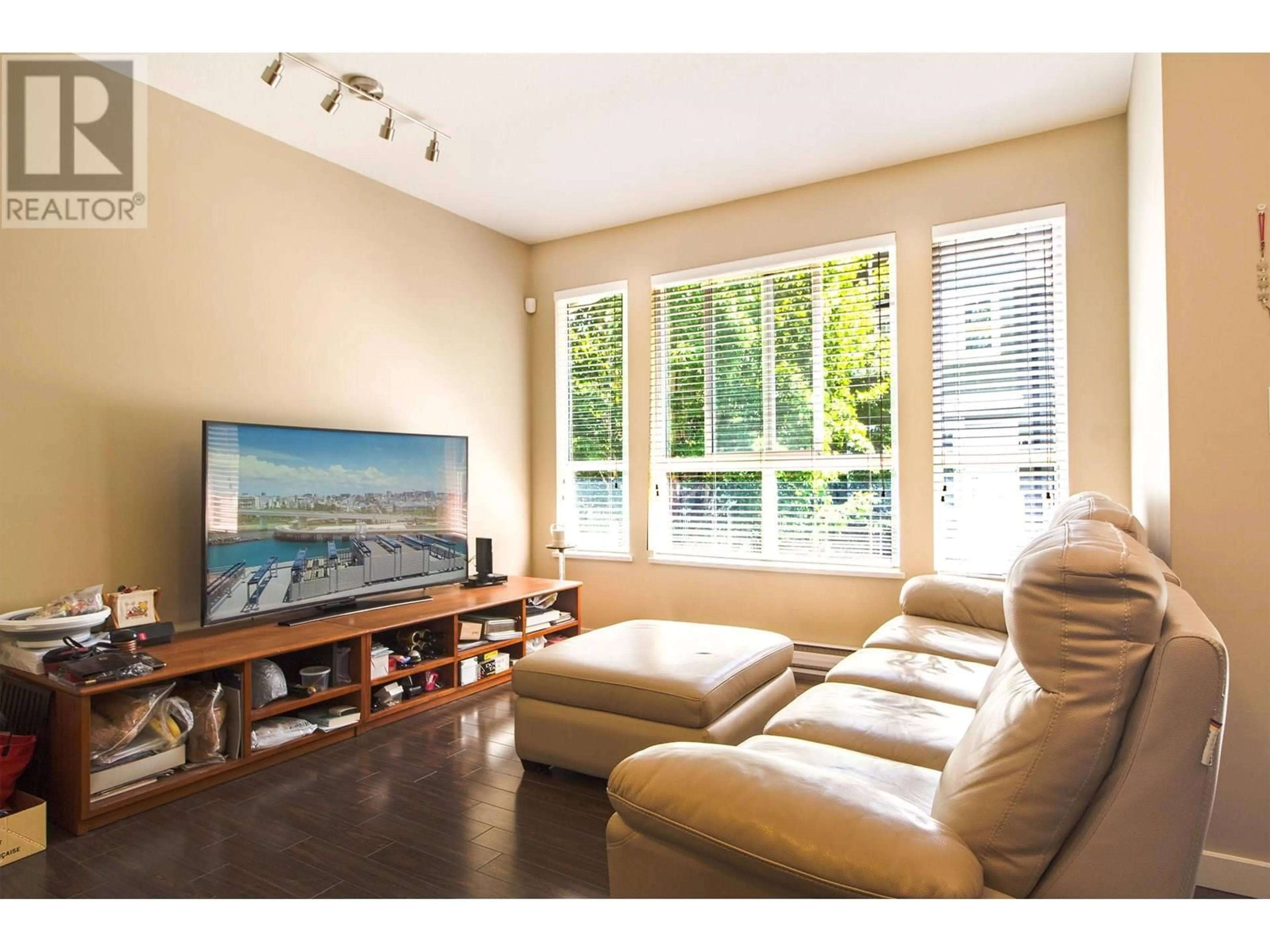 Living room with furniture, wood/laminate floor for 22 - 22380 SHARPE AVENUE, Richmond British Columbia V6V0A1