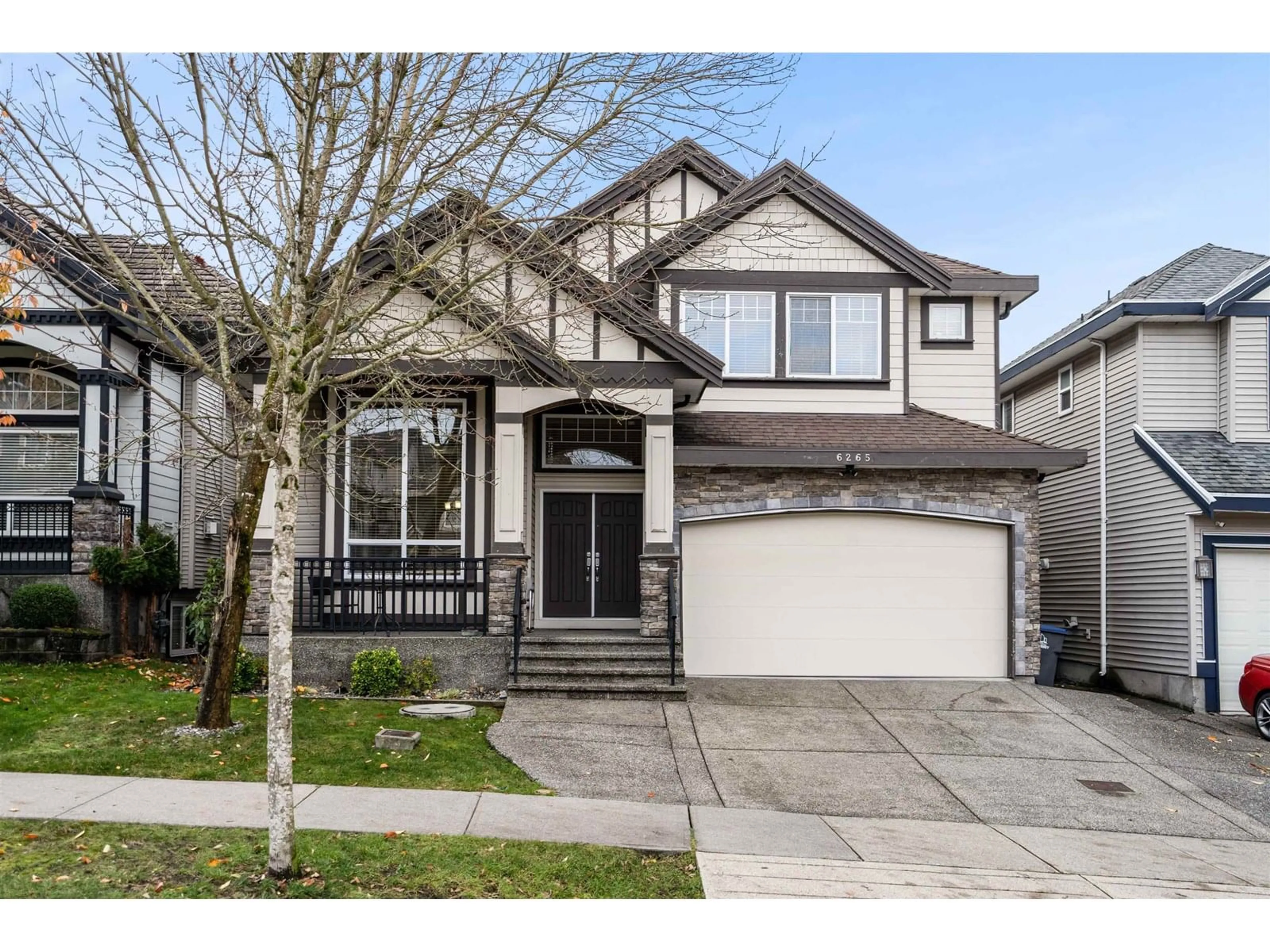 Home with vinyl exterior material, street for 6265 141A, Surrey British Columbia V3X0B2