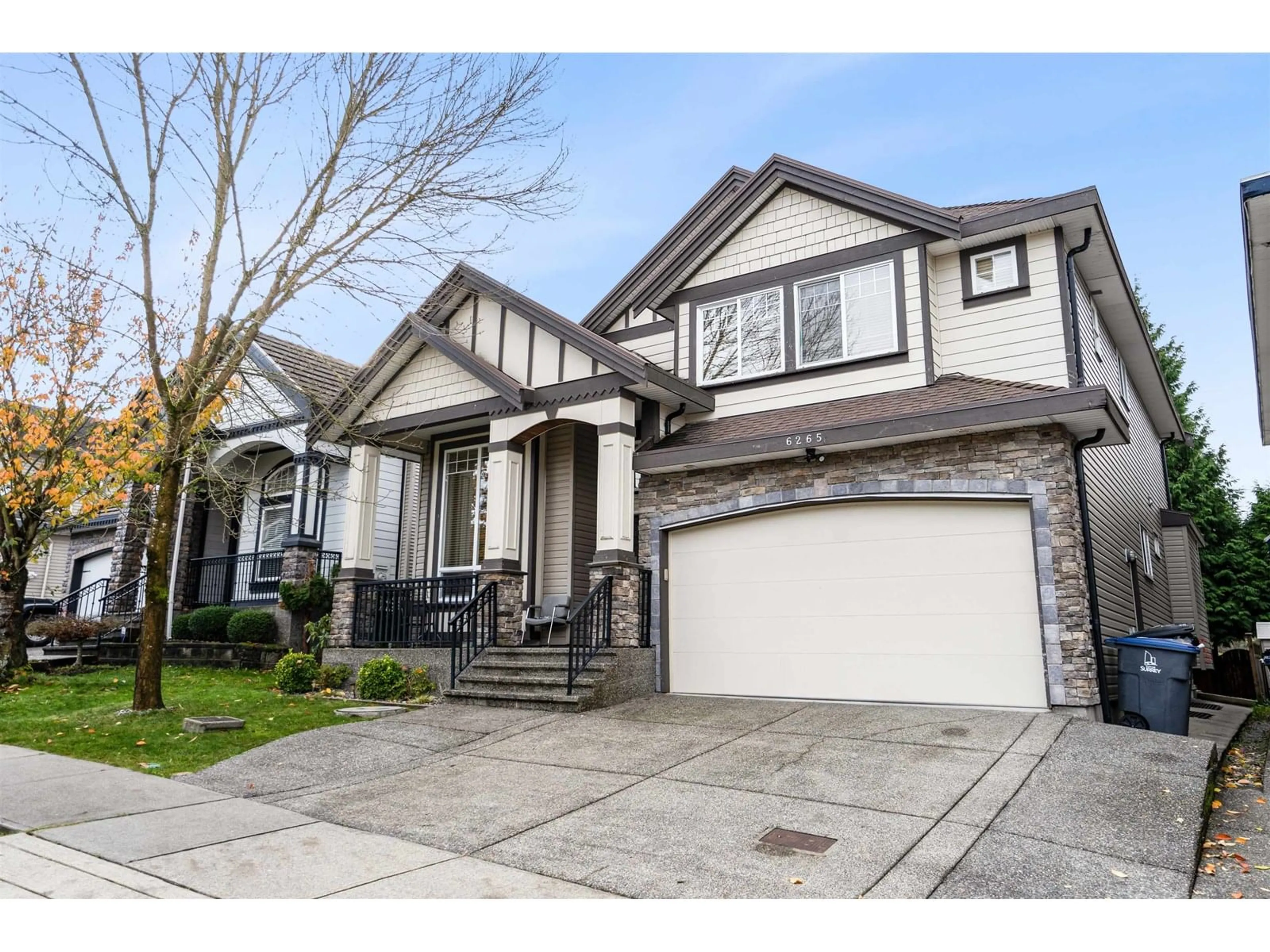 Home with vinyl exterior material, street for 6265 141A, Surrey British Columbia V3X0B2