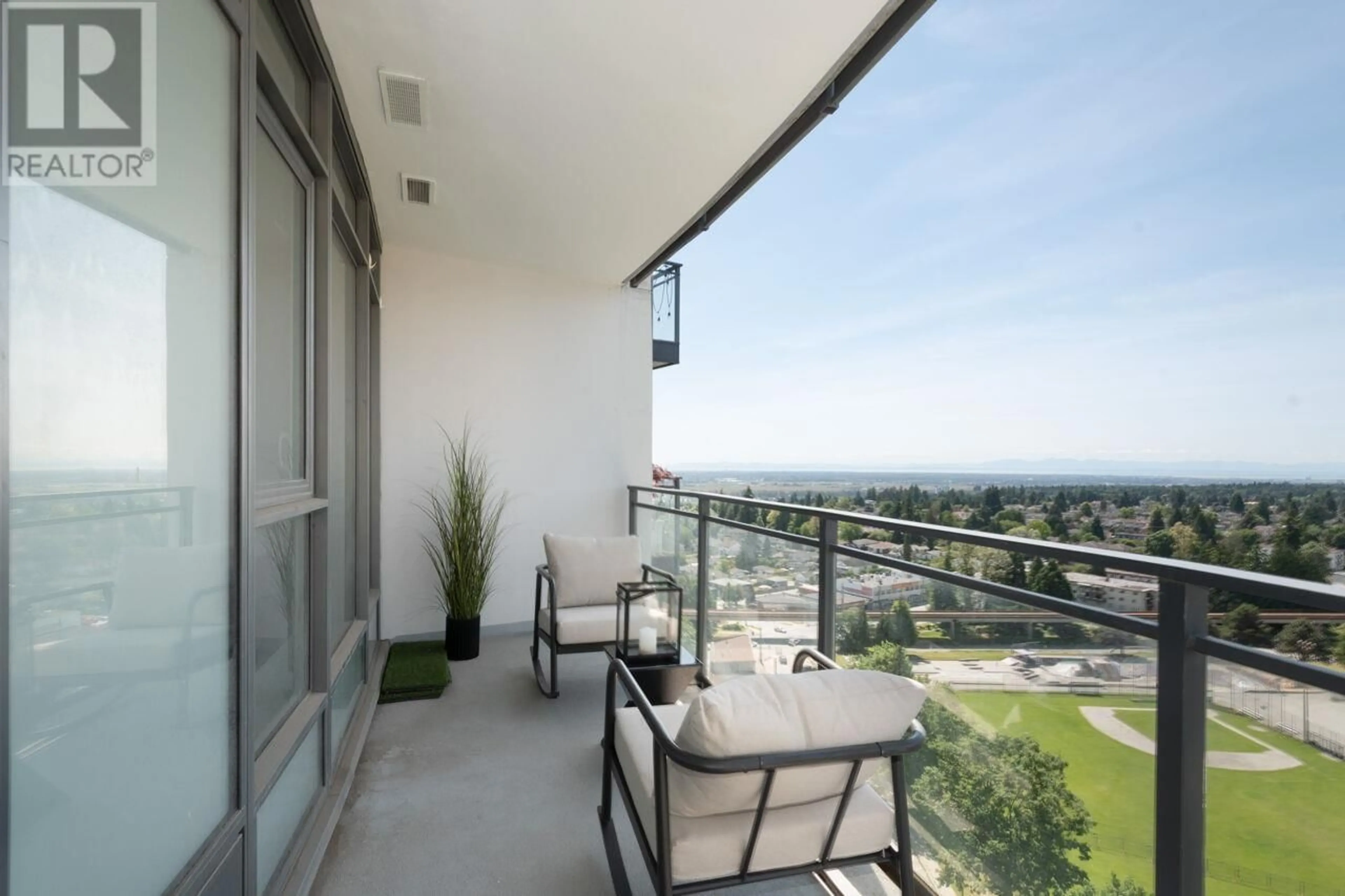 Patio, city buildings view from balcony for 2104 - 4900 LENNOX LANE, Burnaby British Columbia V5H0G9