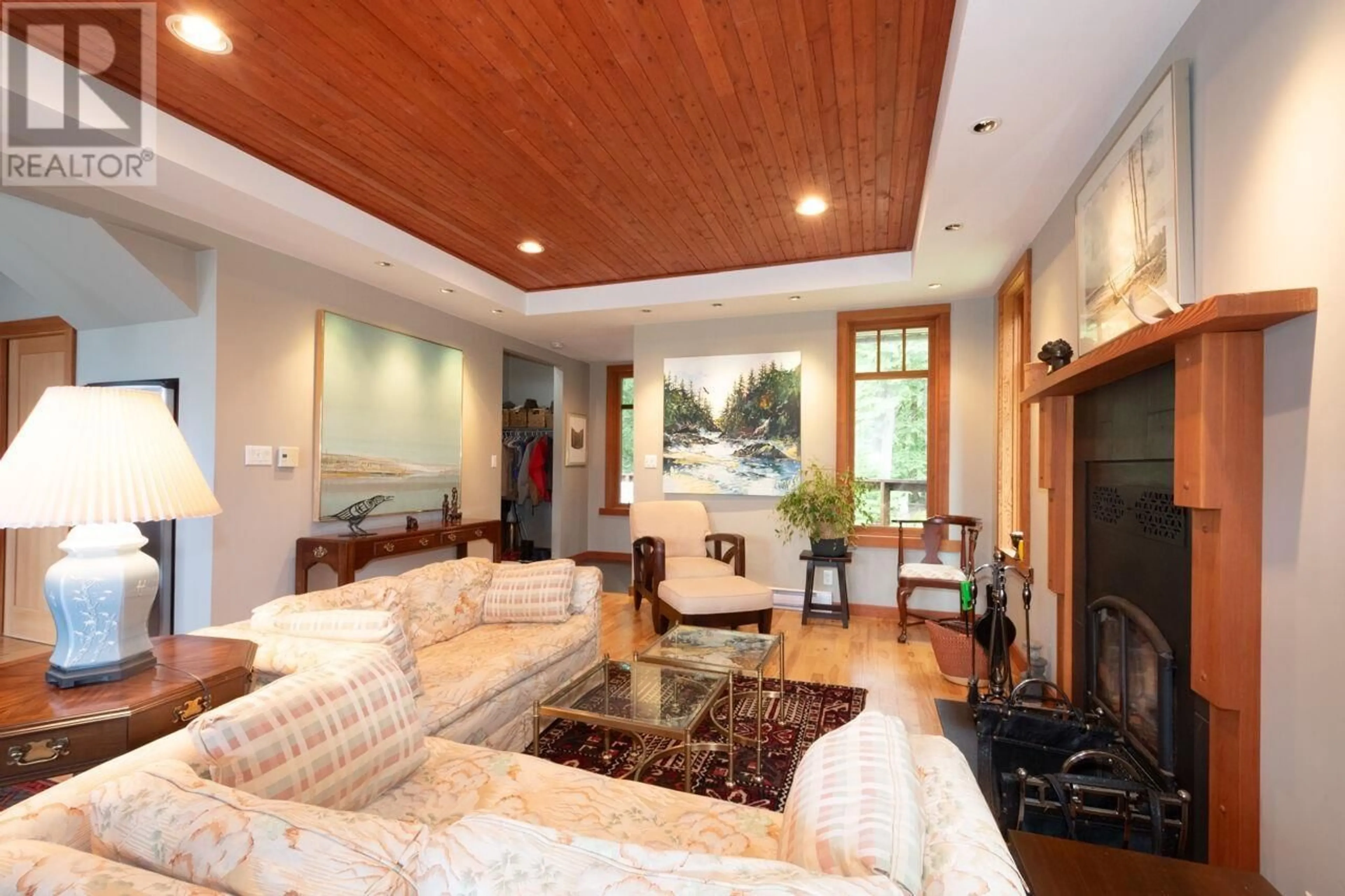 Living room with furniture, wood/laminate floor for 1029 CENTER BAY ROAD, Gambier Island British Columbia V0N1V0