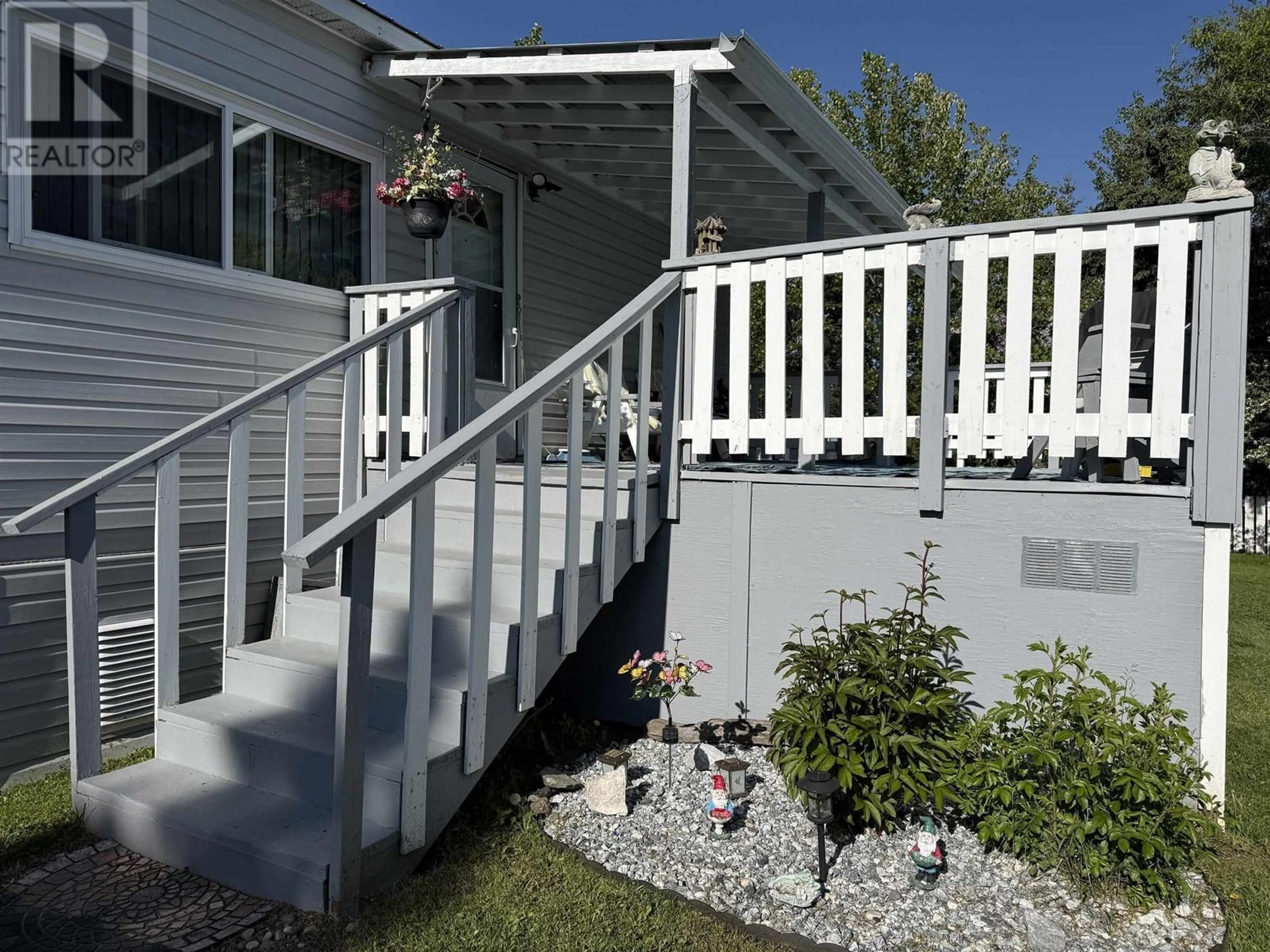 Home with vinyl exterior material, street for 1854 SOMMERVILLE ROAD, Prince George British Columbia V2N6T5