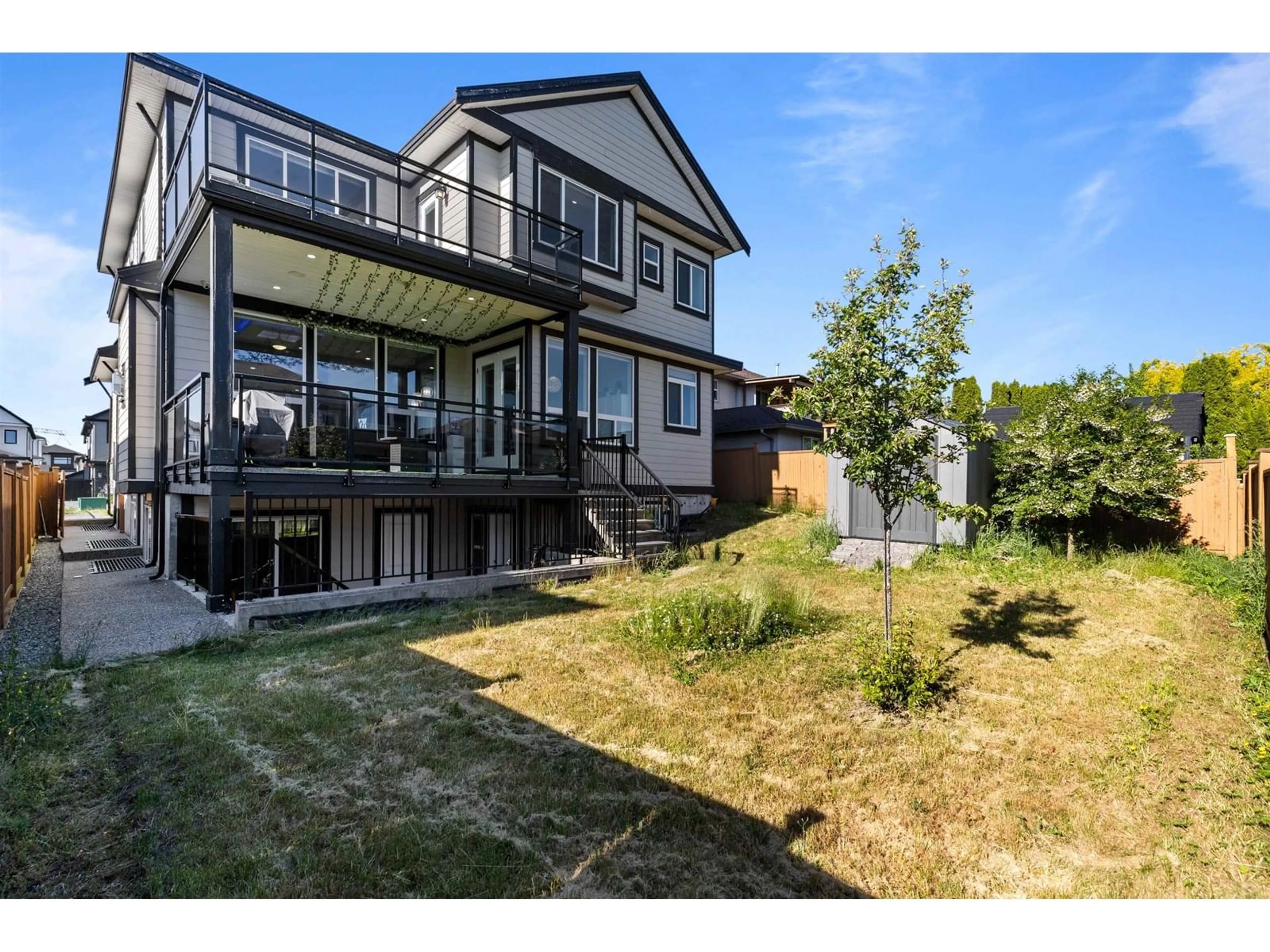 A pic from outside/outdoor area/front of a property/back of a property/a pic from drone, unknown for 18616 56B, Surrey British Columbia V3S8J3
