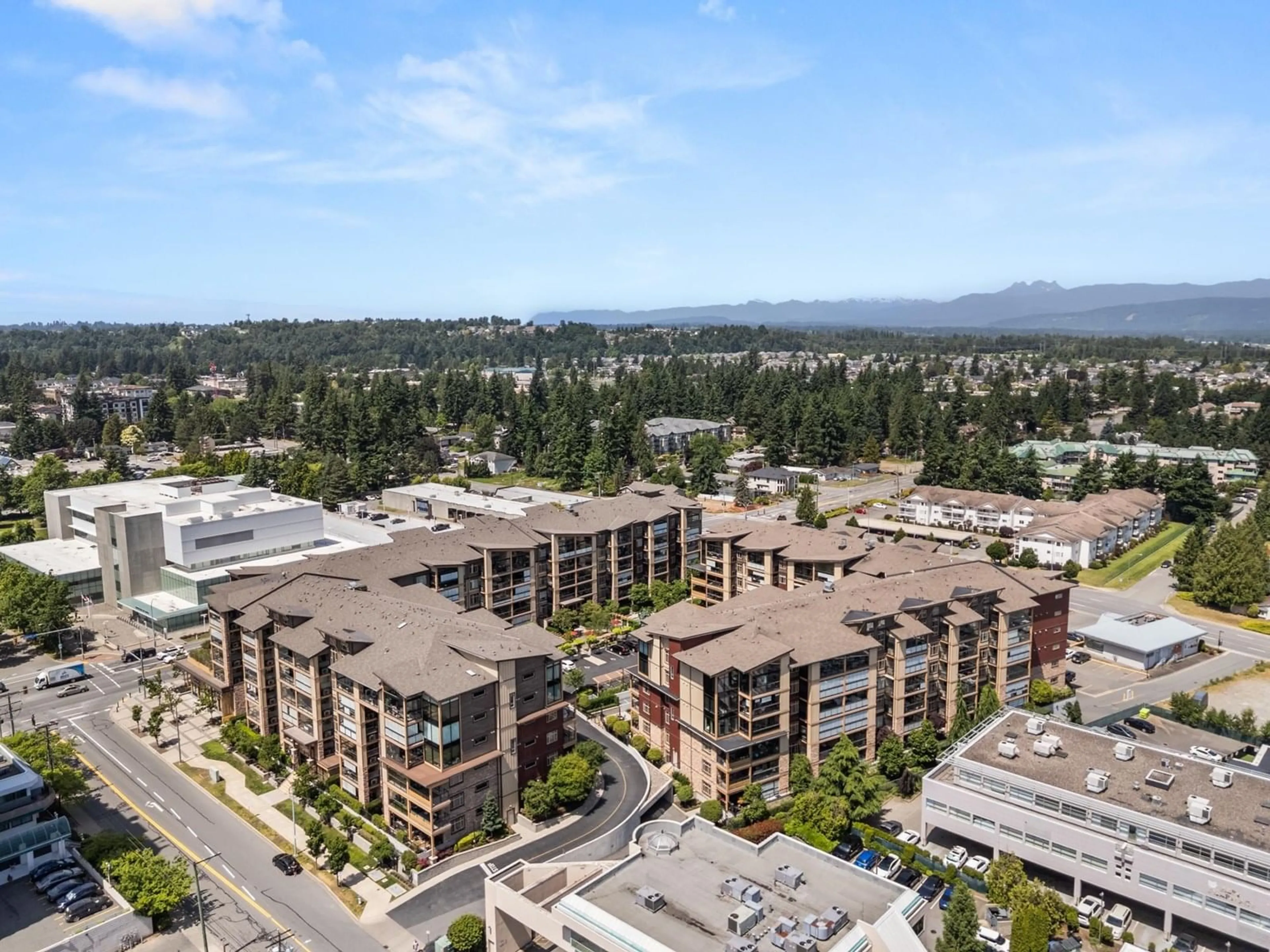 A pic from outside/outdoor area/front of a property/back of a property/a pic from drone, mountain view for 312 - 2860 TRETHEWEY, Abbotsford British Columbia V2T0G5