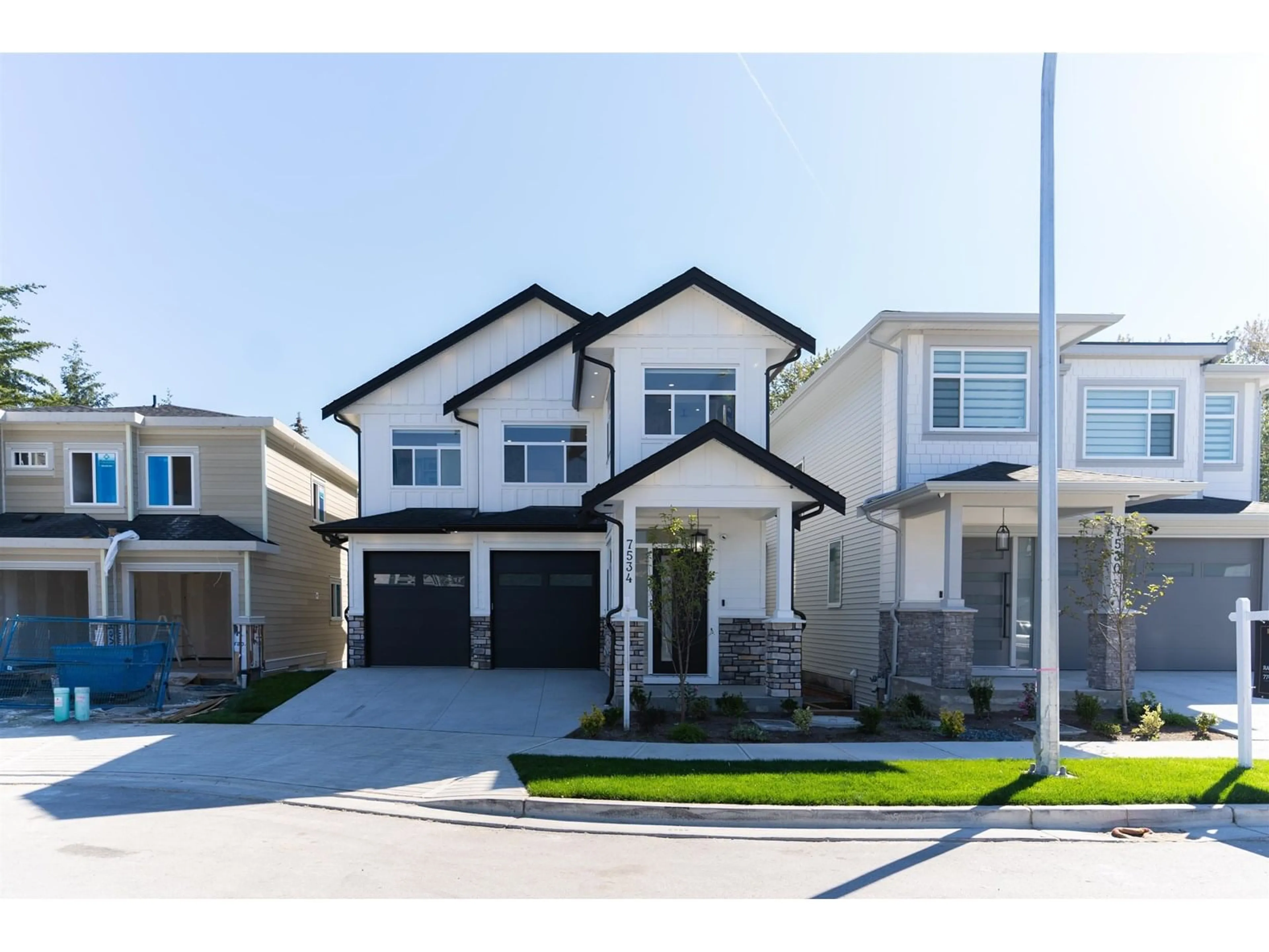 Home with vinyl exterior material, street for 7534 205A, Langley British Columbia V2Y1V5