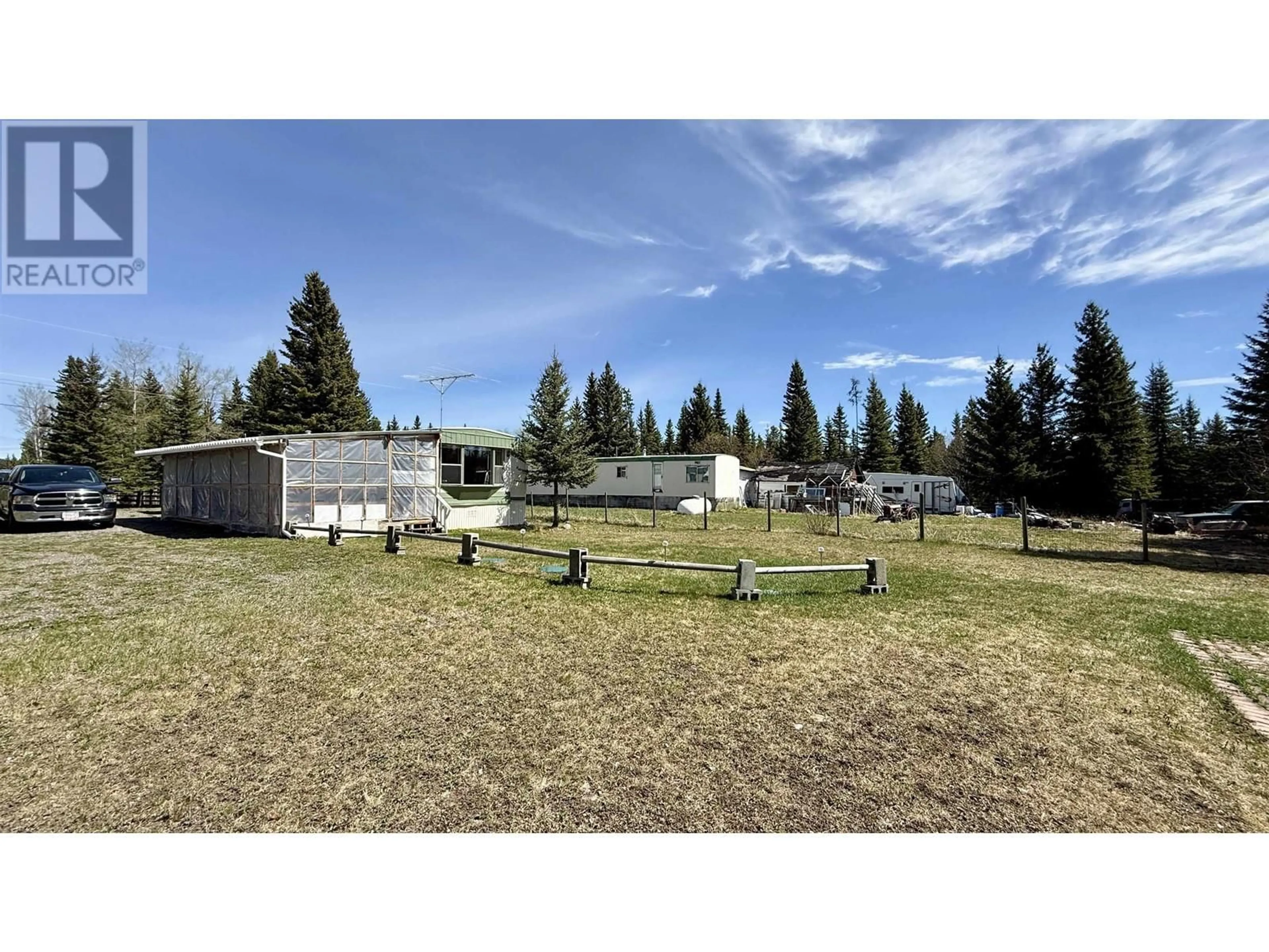 A pic from outside/outdoor area/front of a property/back of a property/a pic from drone, mountain view for 7568 LUDLOM ROAD, Deka Lake / Sulphurous / Hathaway Lakes British Columbia V0K1X3
