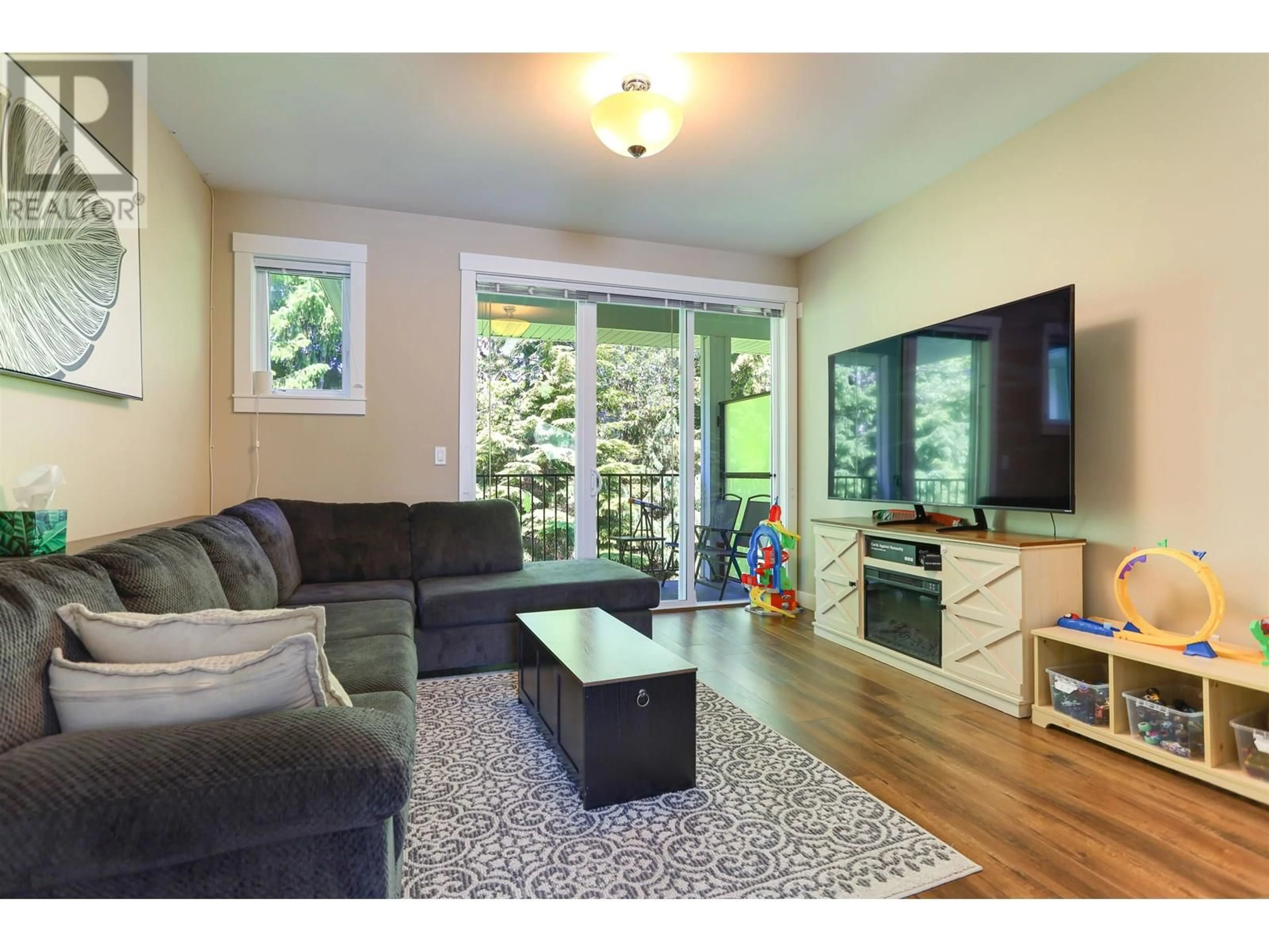 Living room with furniture, wood/laminate floor for 404 - 110 BAXTER AVENUE, Kitimat British Columbia V8C2N9
