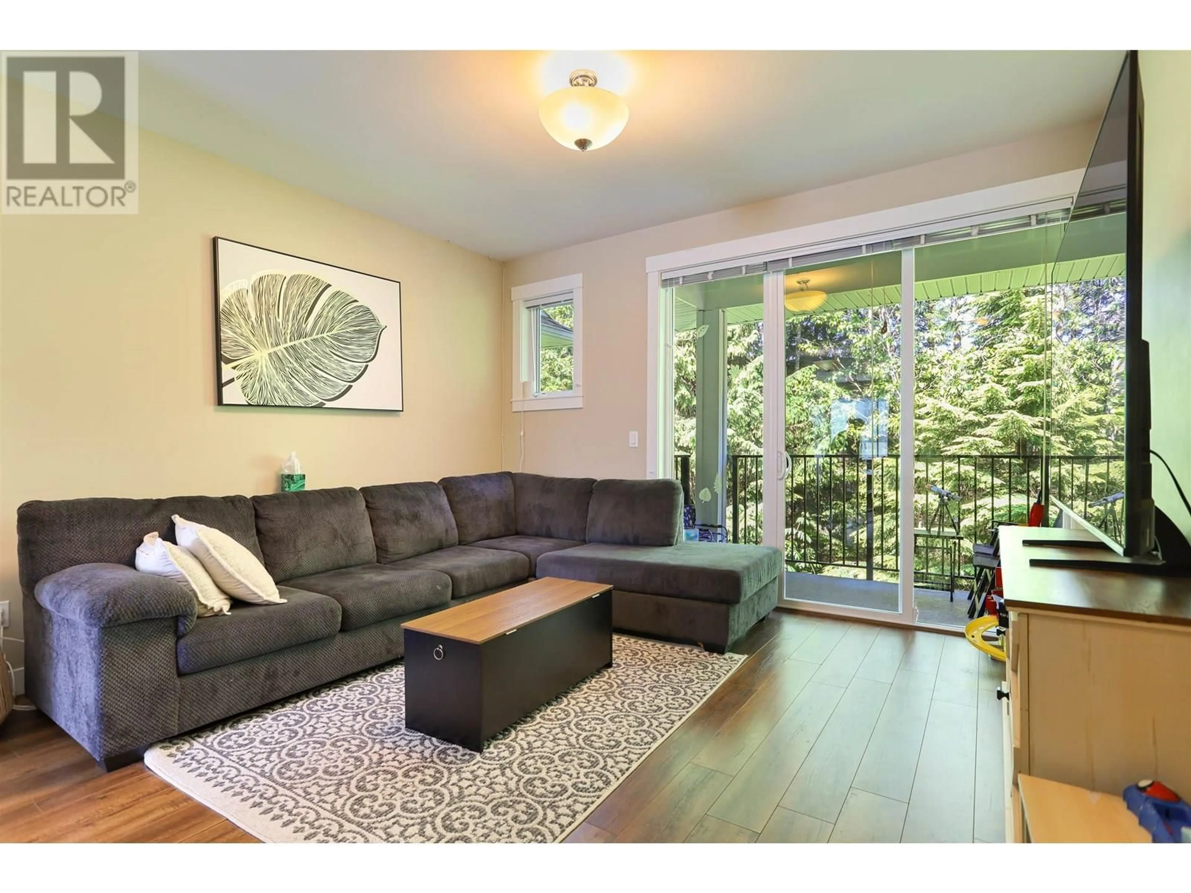 Living room with furniture, wood/laminate floor for 404 - 110 BAXTER AVENUE, Kitimat British Columbia V8C2N9