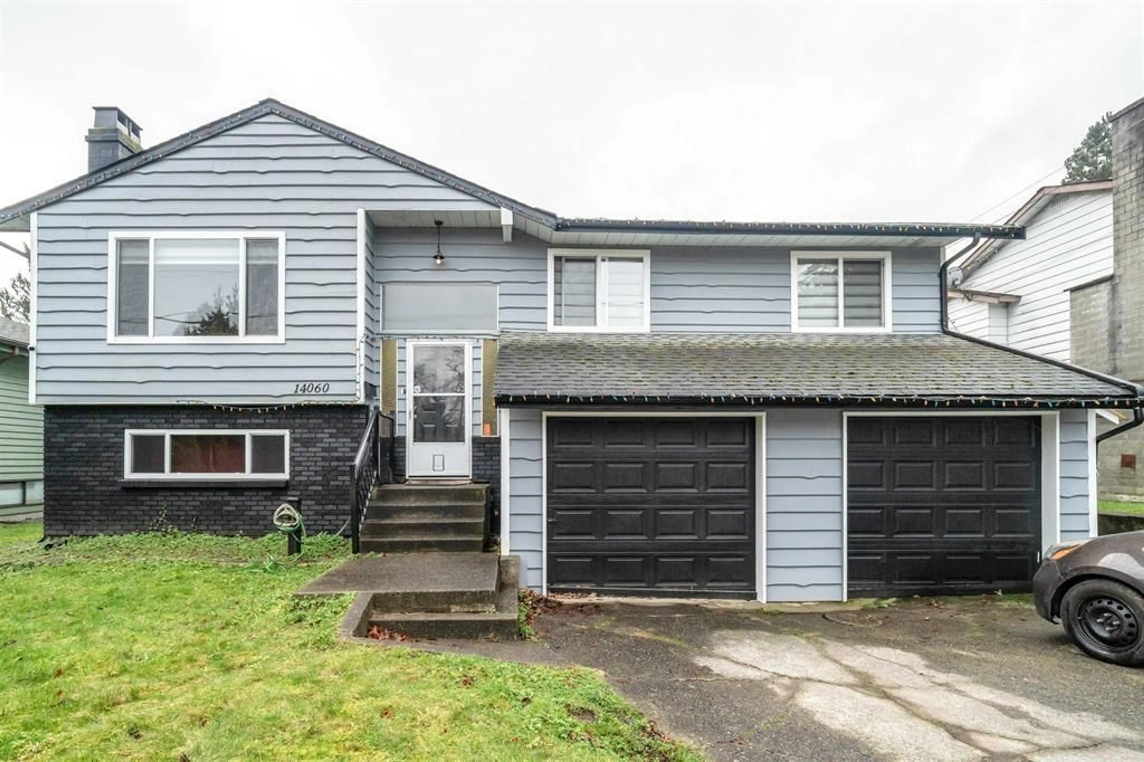Home with vinyl exterior material, street for 14060 80, Surrey British Columbia V3W3C4