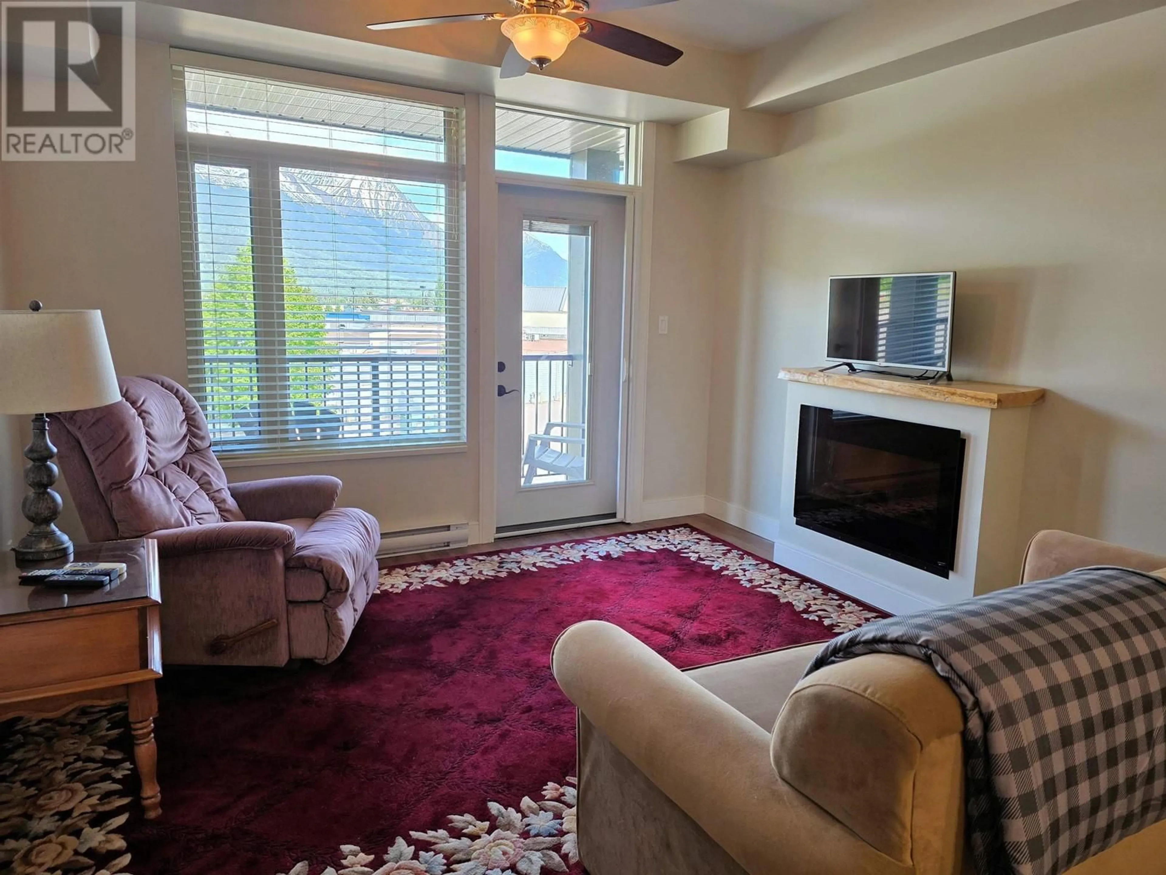Living room with furniture, carpet floor for 302 - 3684 PRINCESS CRESCENT, Smithers British Columbia V0J2N0