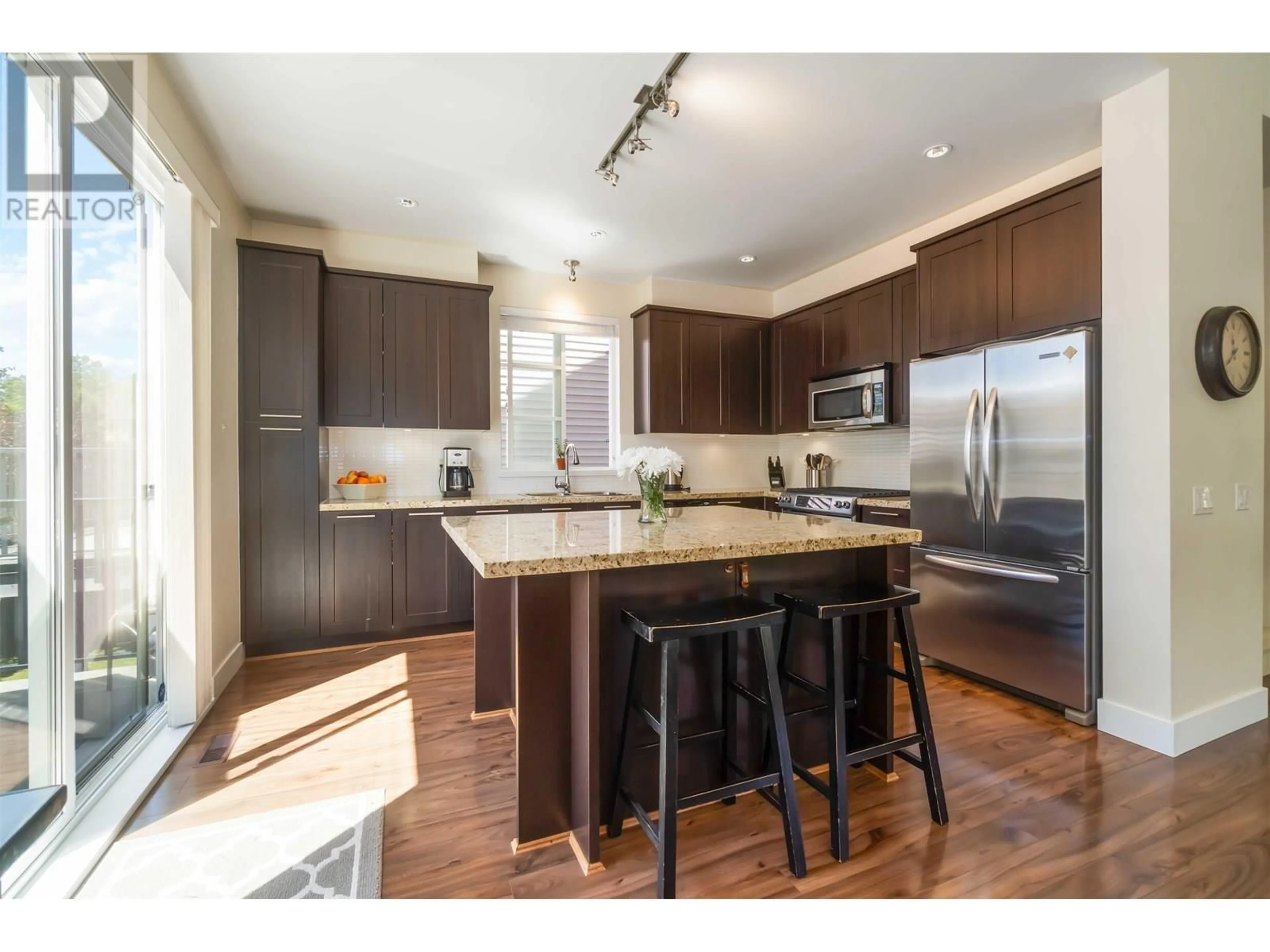 Open concept kitchen, wood/laminate floor for 3452 DARWIN AVENUE, Coquitlam British Columbia V3B3H7
