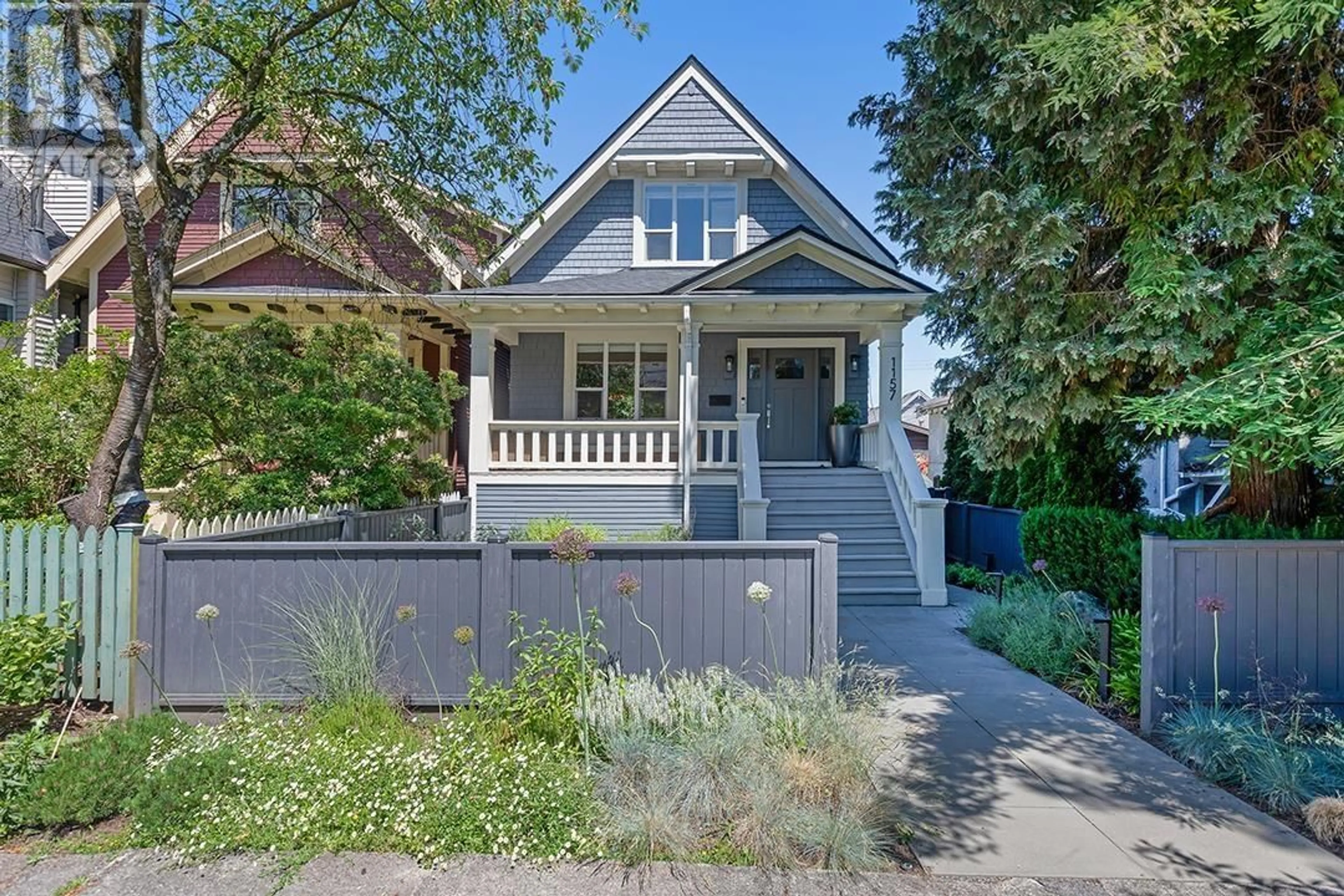 Home with vinyl exterior material, street for 1157 13TH AVENUE, Vancouver British Columbia V5T2M2
