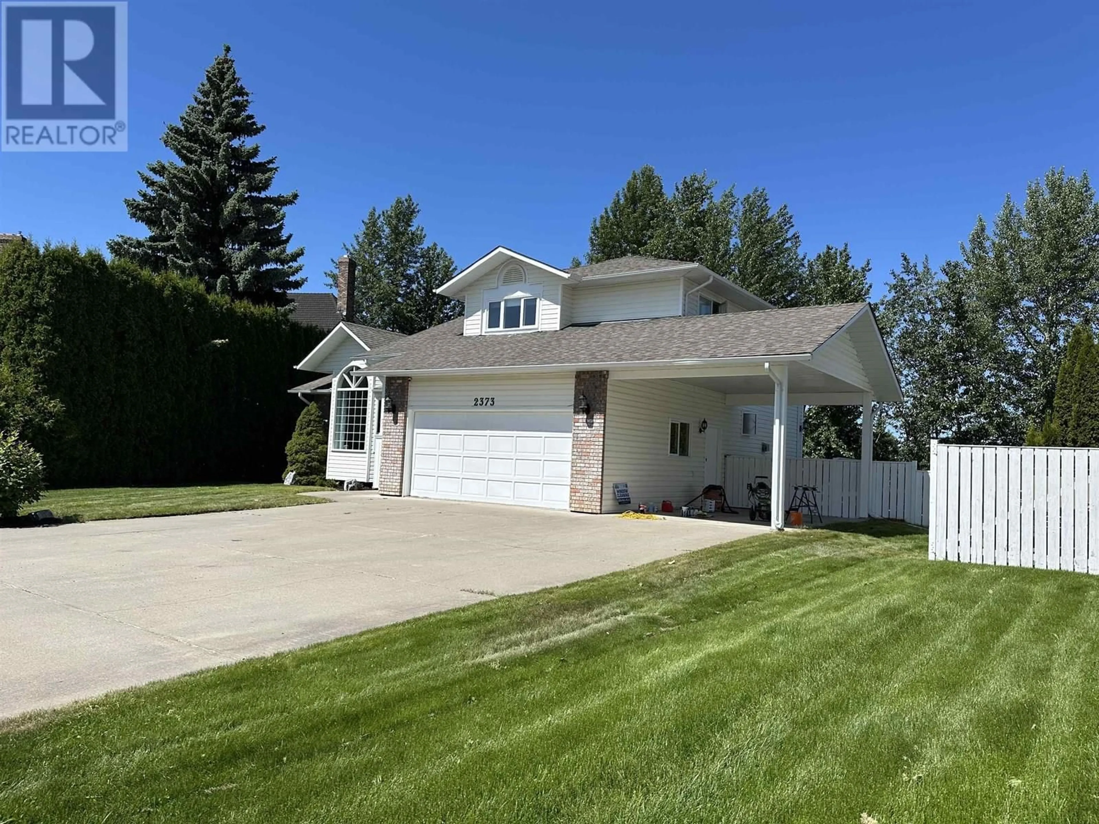 Home with vinyl exterior material, street for 2373 SADLER DRIVE, Prince George British Columbia V2K4N7