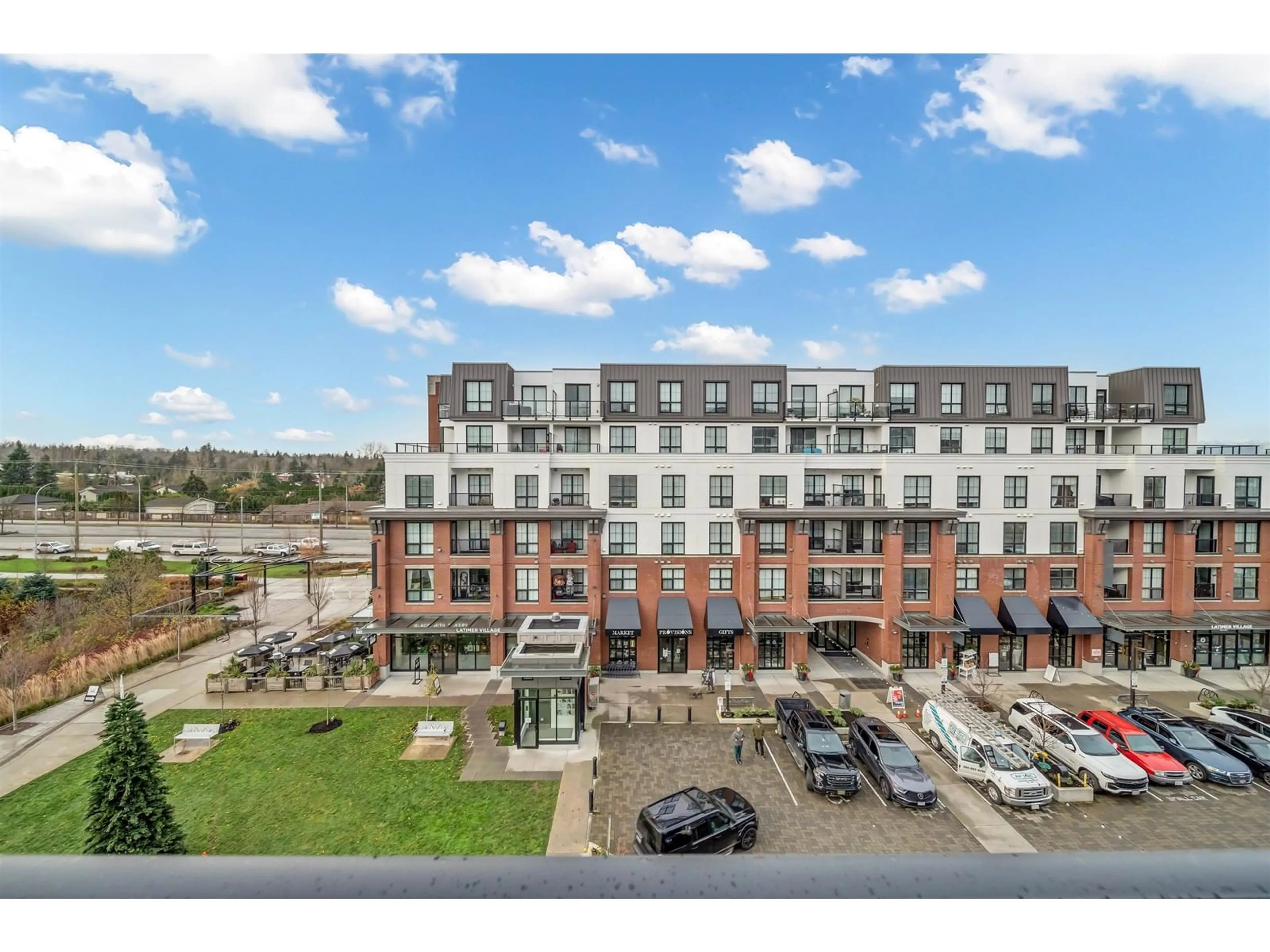 A pic from outside/outdoor area/front of a property/back of a property/a pic from drone, unknown for B403 - 20018 83A, Langley British Columbia V2Y3P3