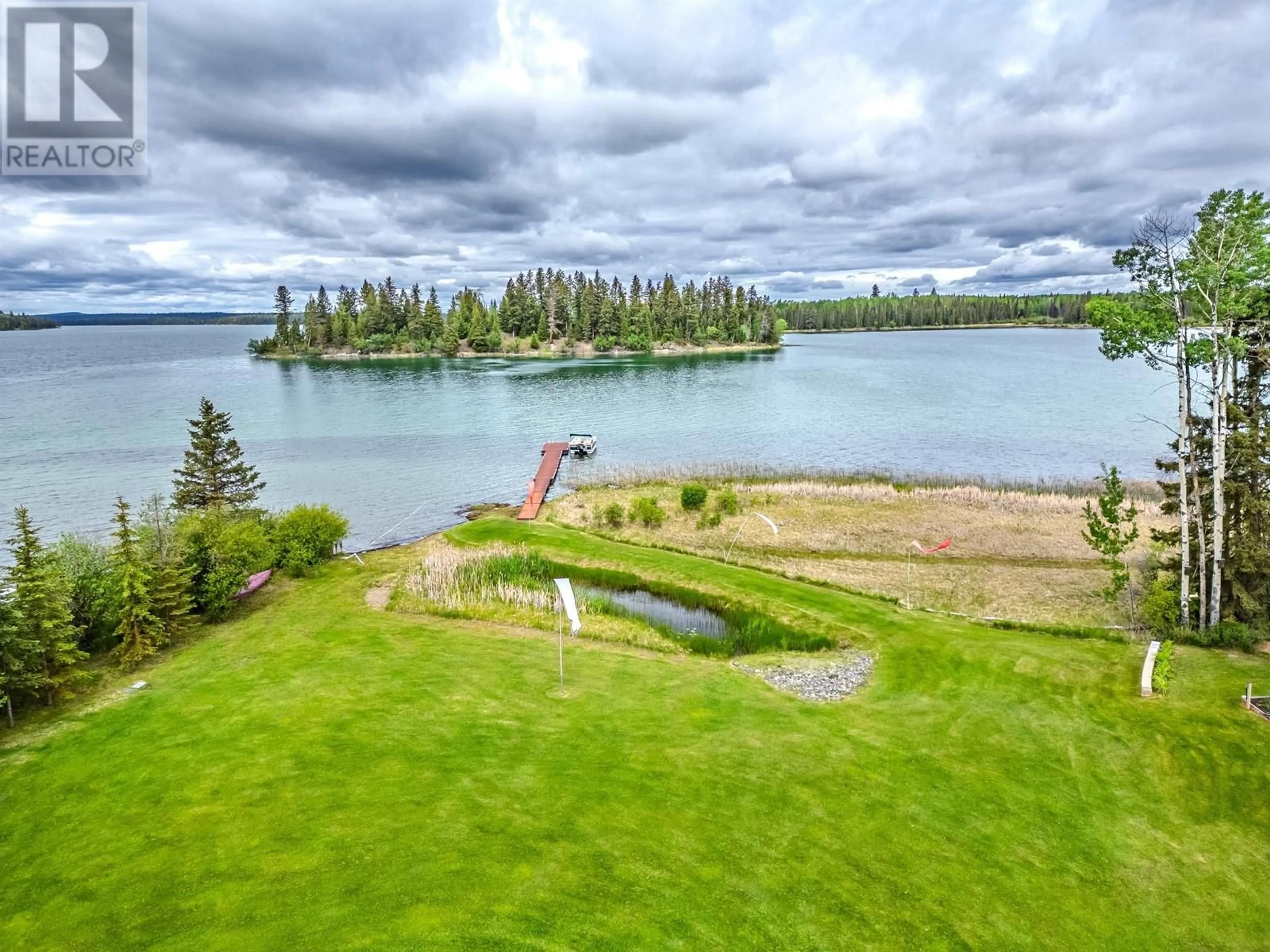 A pic from outside/outdoor area/front of a property/back of a property/a pic from drone, water/lake/river/ocean view for 7592 SHERIDAN LAKE ROAD, Sheridan Lake British Columbia V0K1X2