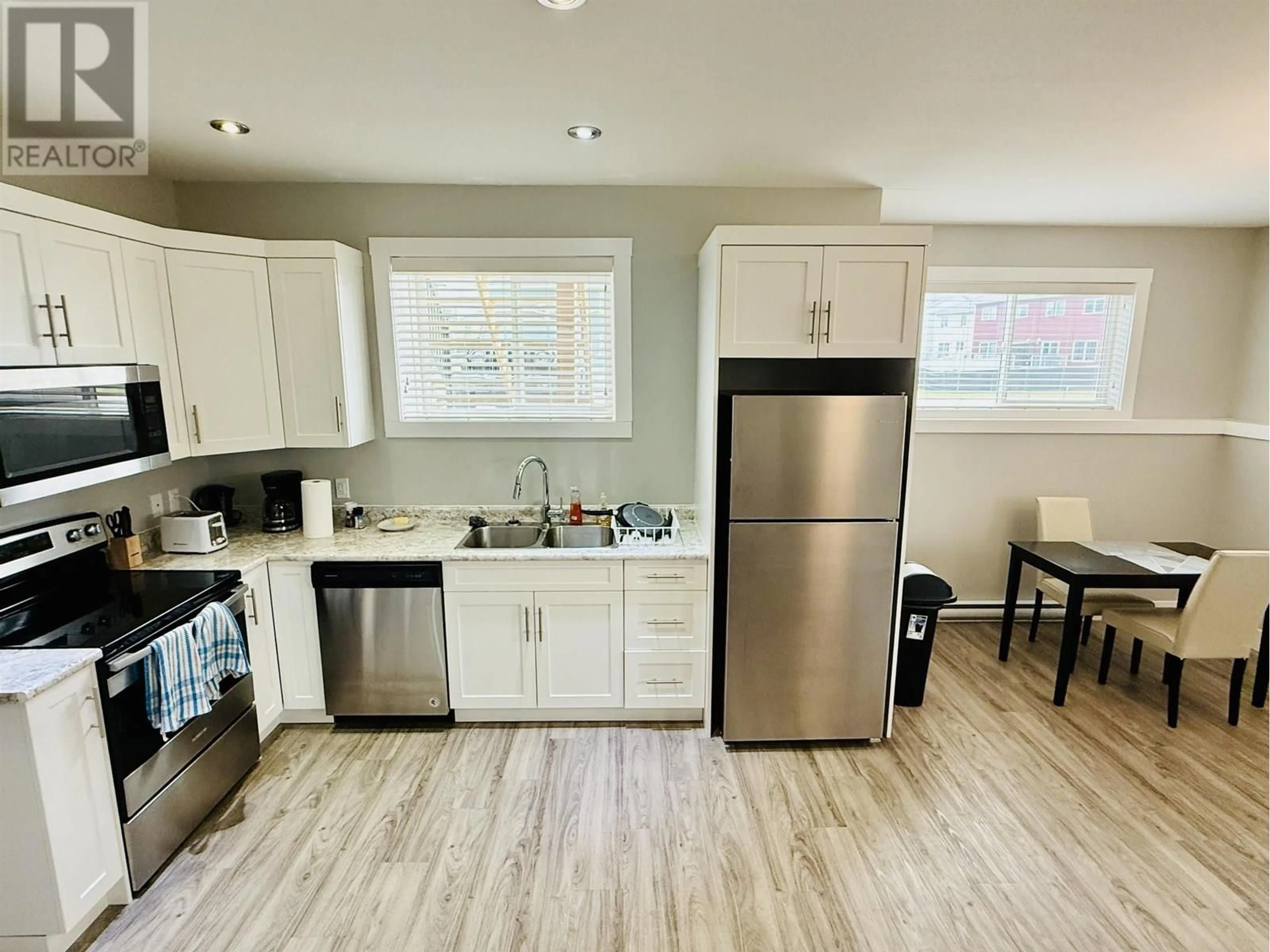 Open concept kitchen, unknown for 8620 85 STREET, Fort St. John British Columbia V1J0S2