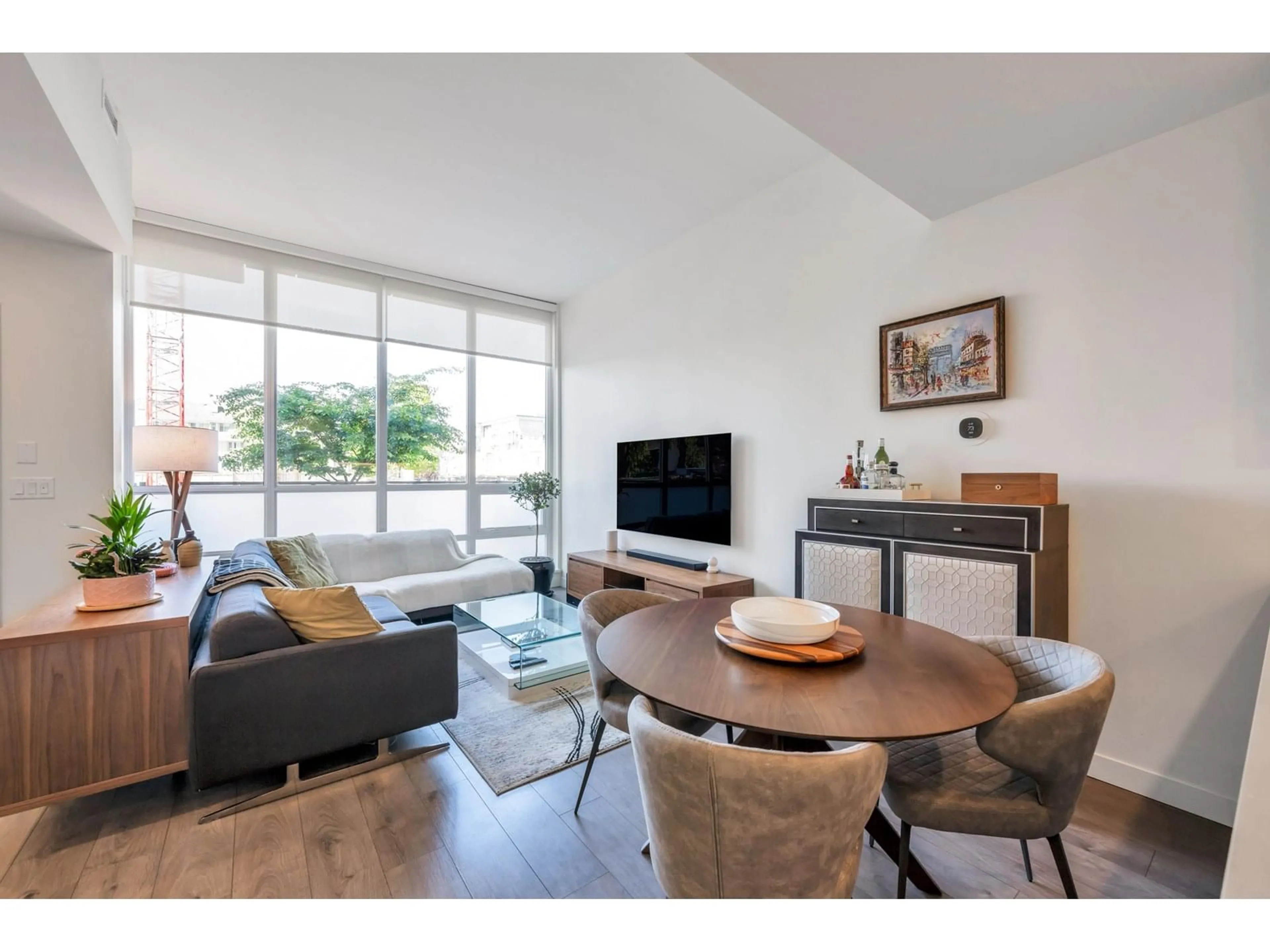 Living room with furniture, wood/laminate floor for TH13 - 10388 133, Surrey British Columbia V3T0R2