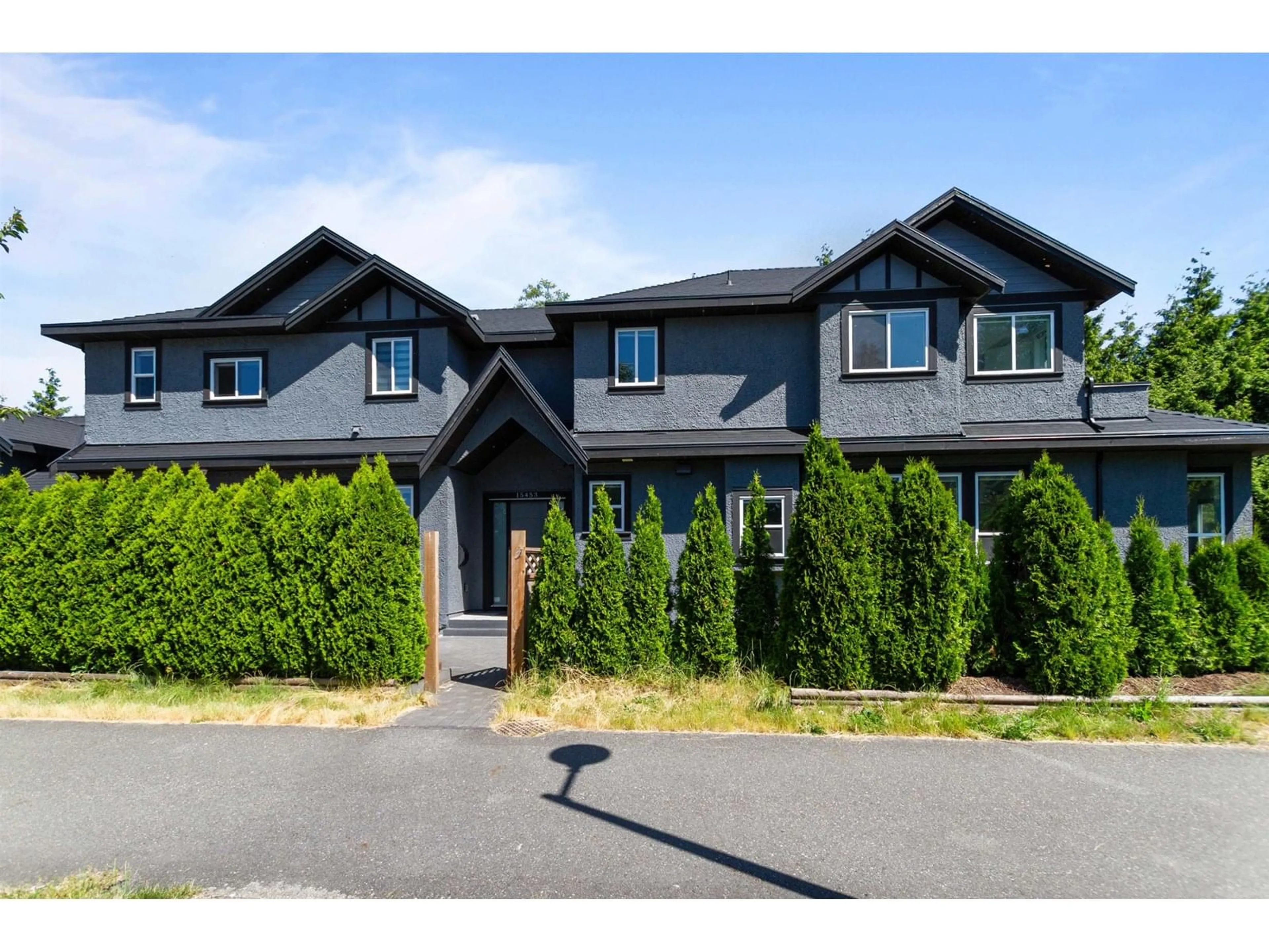 Home with vinyl exterior material, street for 15453 108, Surrey British Columbia V3R6J1