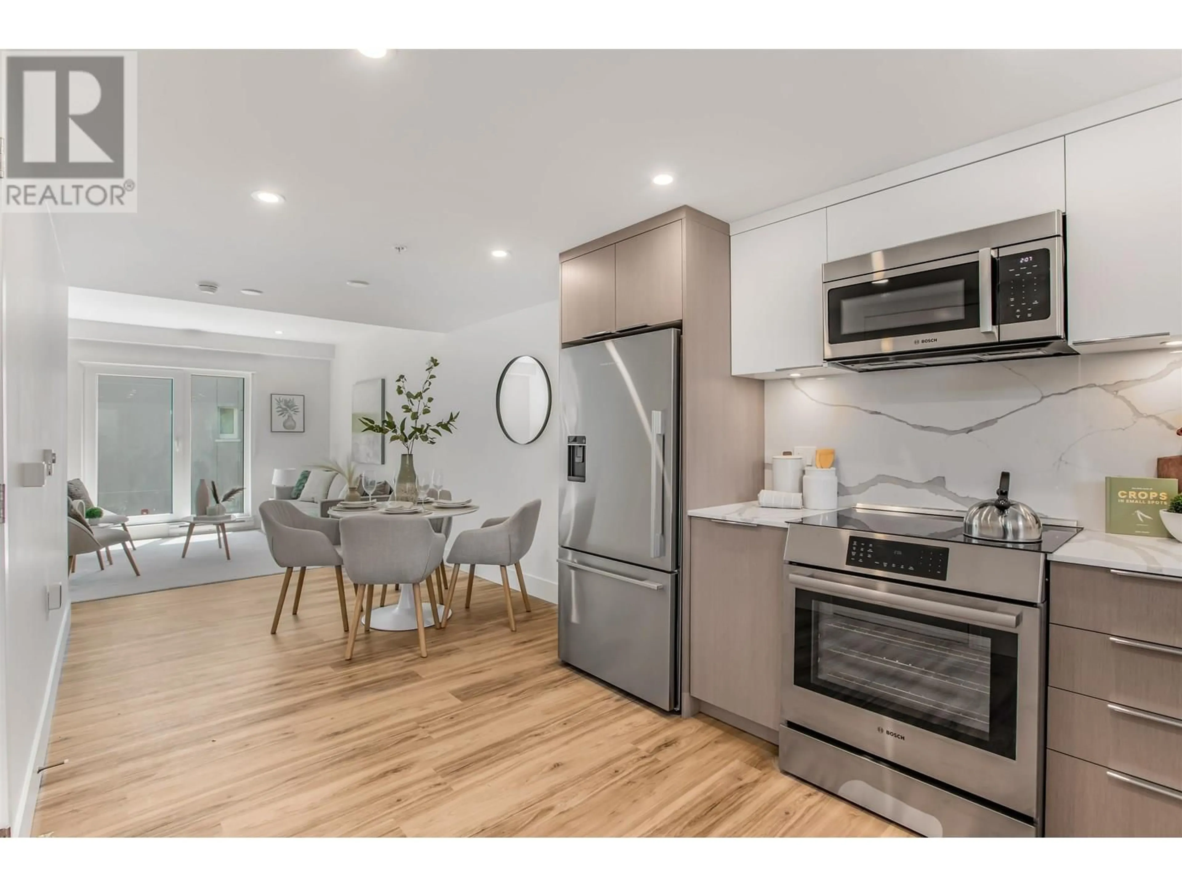 Open concept kitchen, unknown for 204 - 2075 1ST AVENUE, Vancouver British Columbia V5N1B6