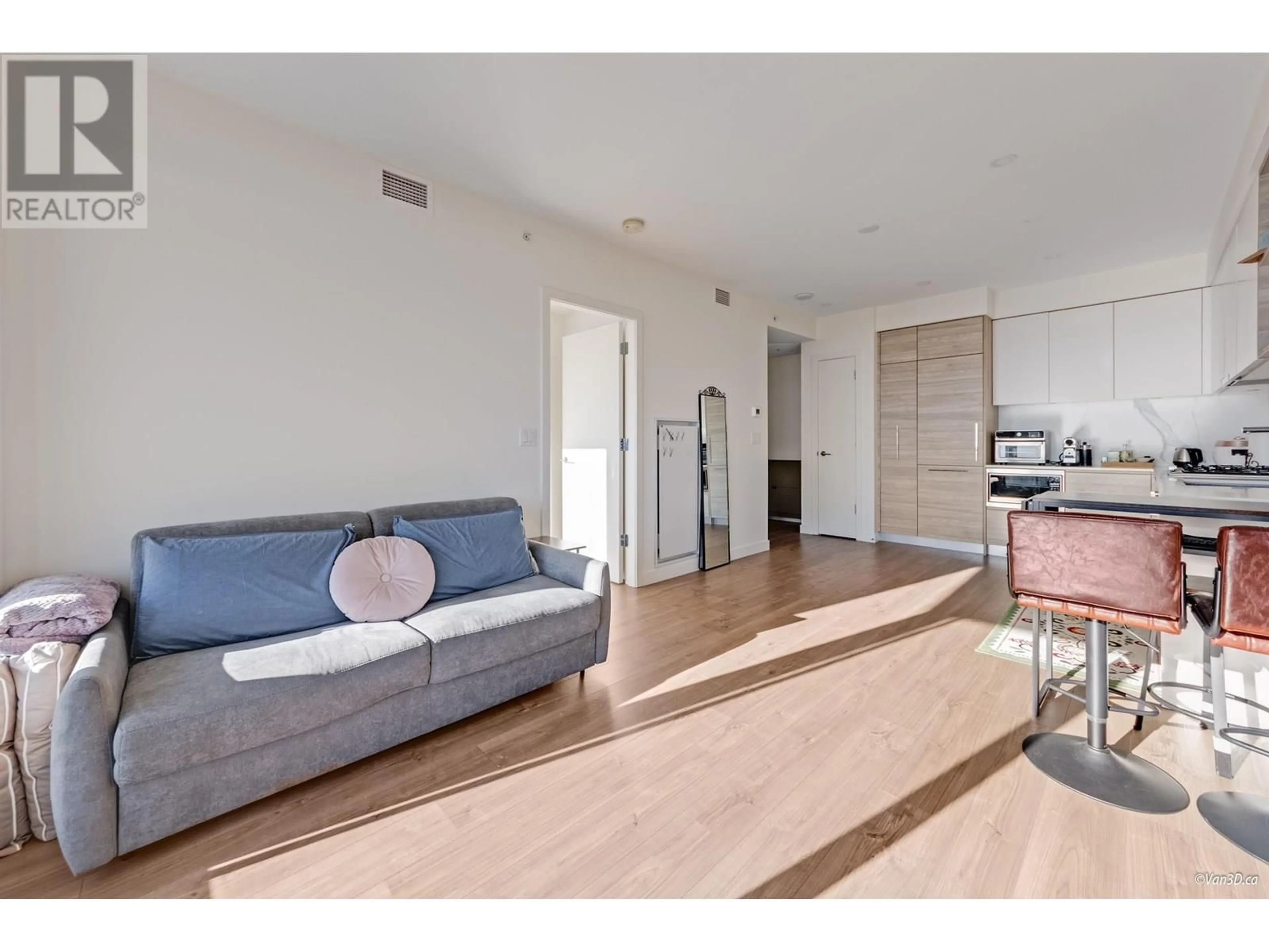 Living room with furniture, wood/laminate floor for 2505 - 595 AUSTIN AVENUE, Coquitlam British Columbia V3K0G7