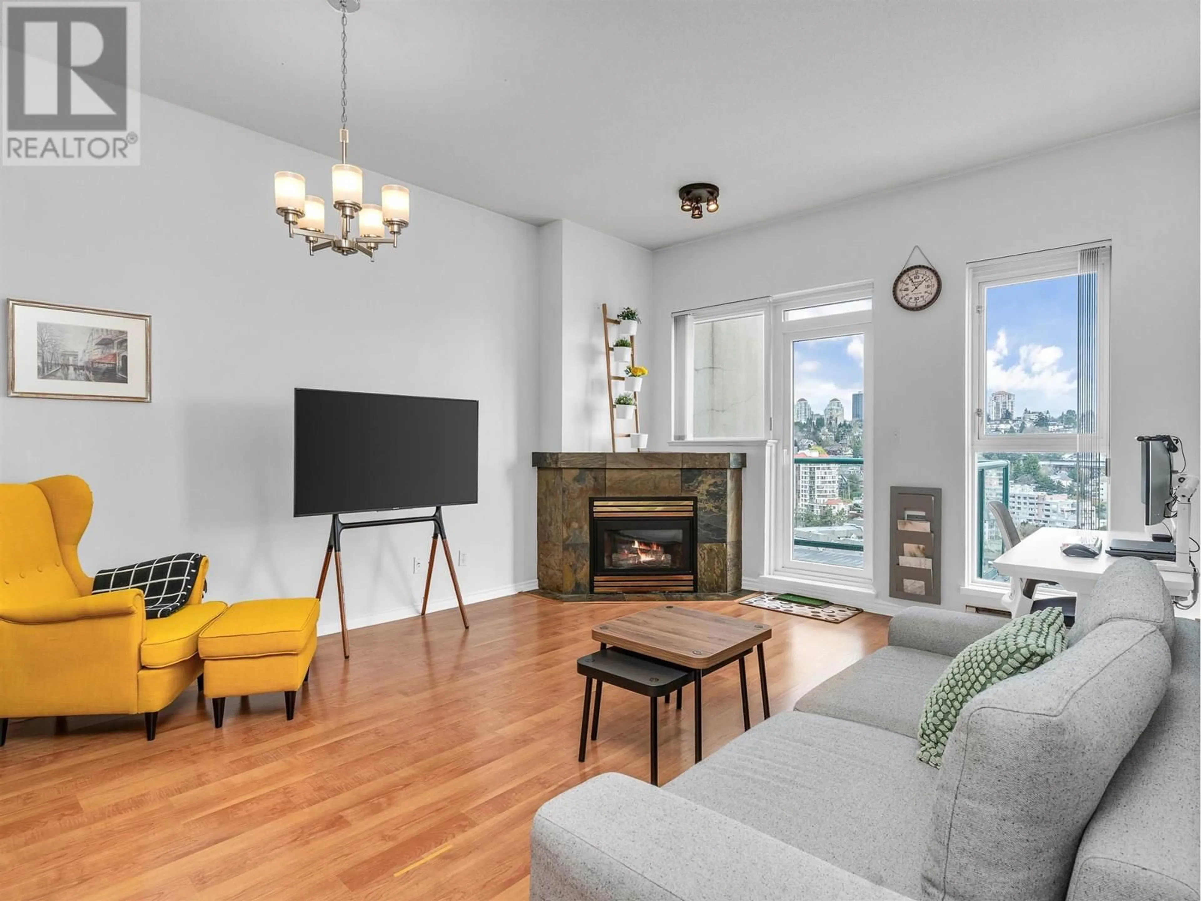Living room with furniture, wood/laminate floor for 2205 - 10 LAGUNA COURT, New Westminster British Columbia V3M6W3