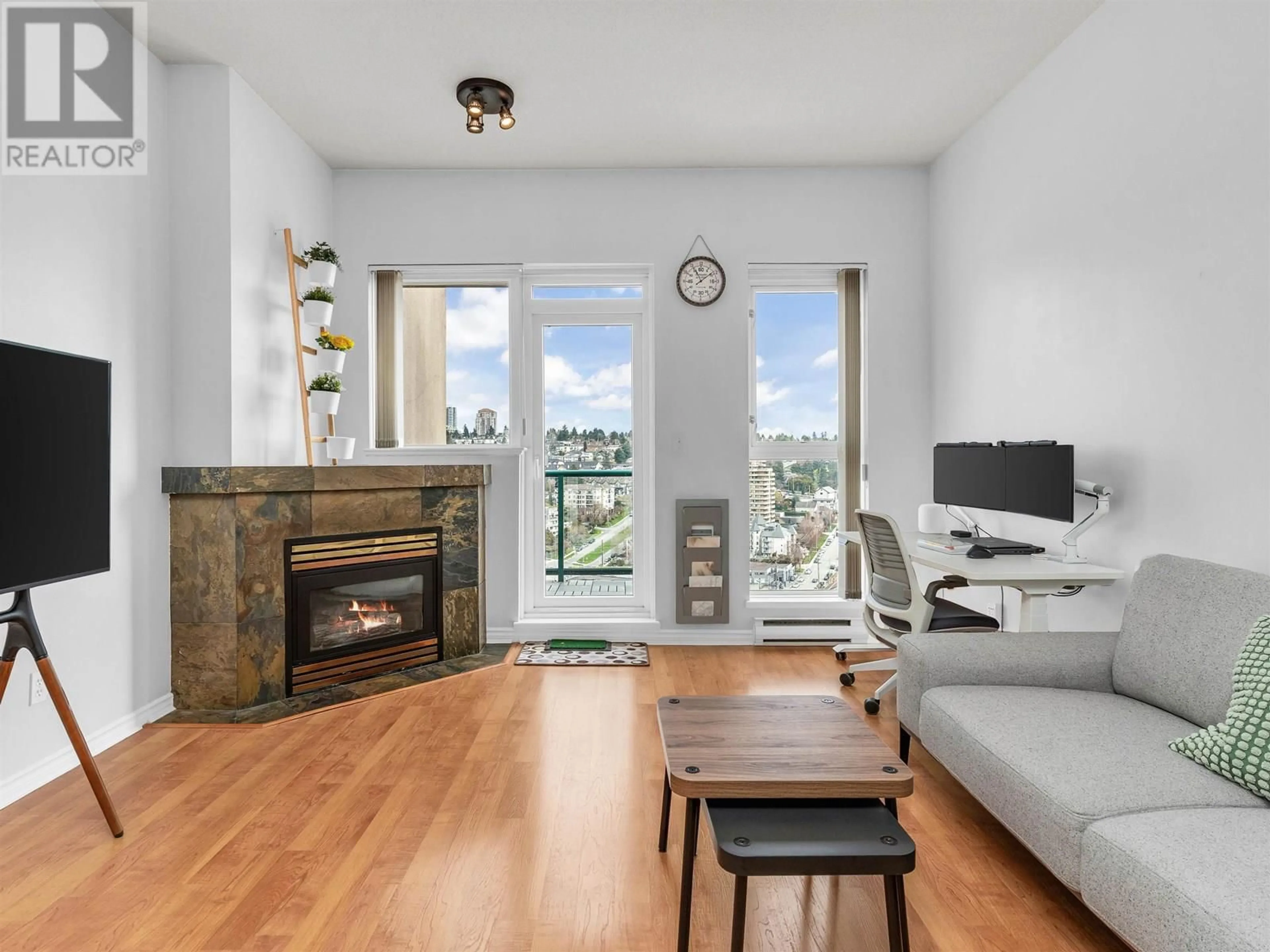 Living room with furniture, wood/laminate floor for 2205 - 10 LAGUNA COURT, New Westminster British Columbia V3M6W3