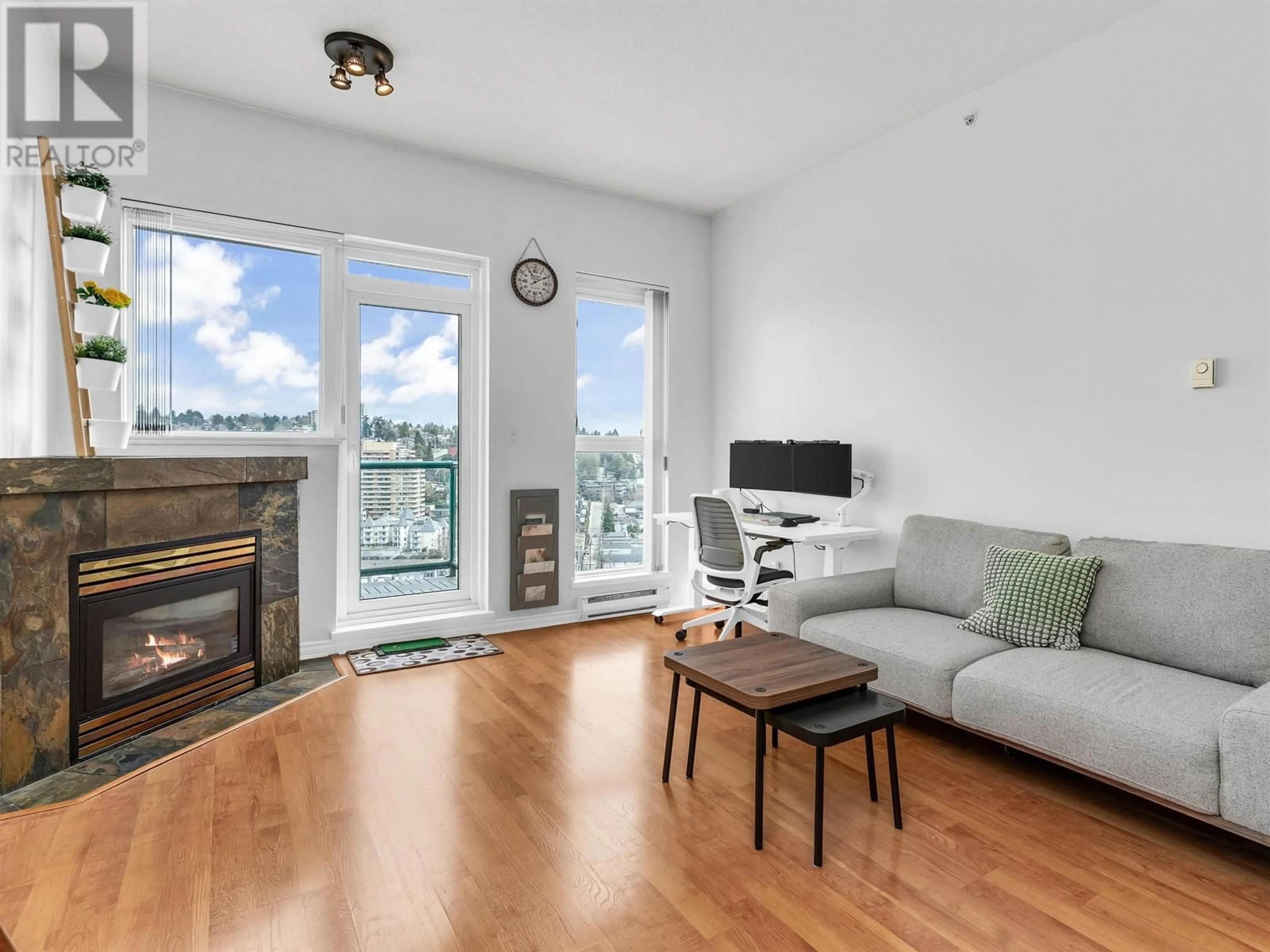 Living room with furniture, wood/laminate floor for 2205 - 10 LAGUNA COURT, New Westminster British Columbia V3M6W3