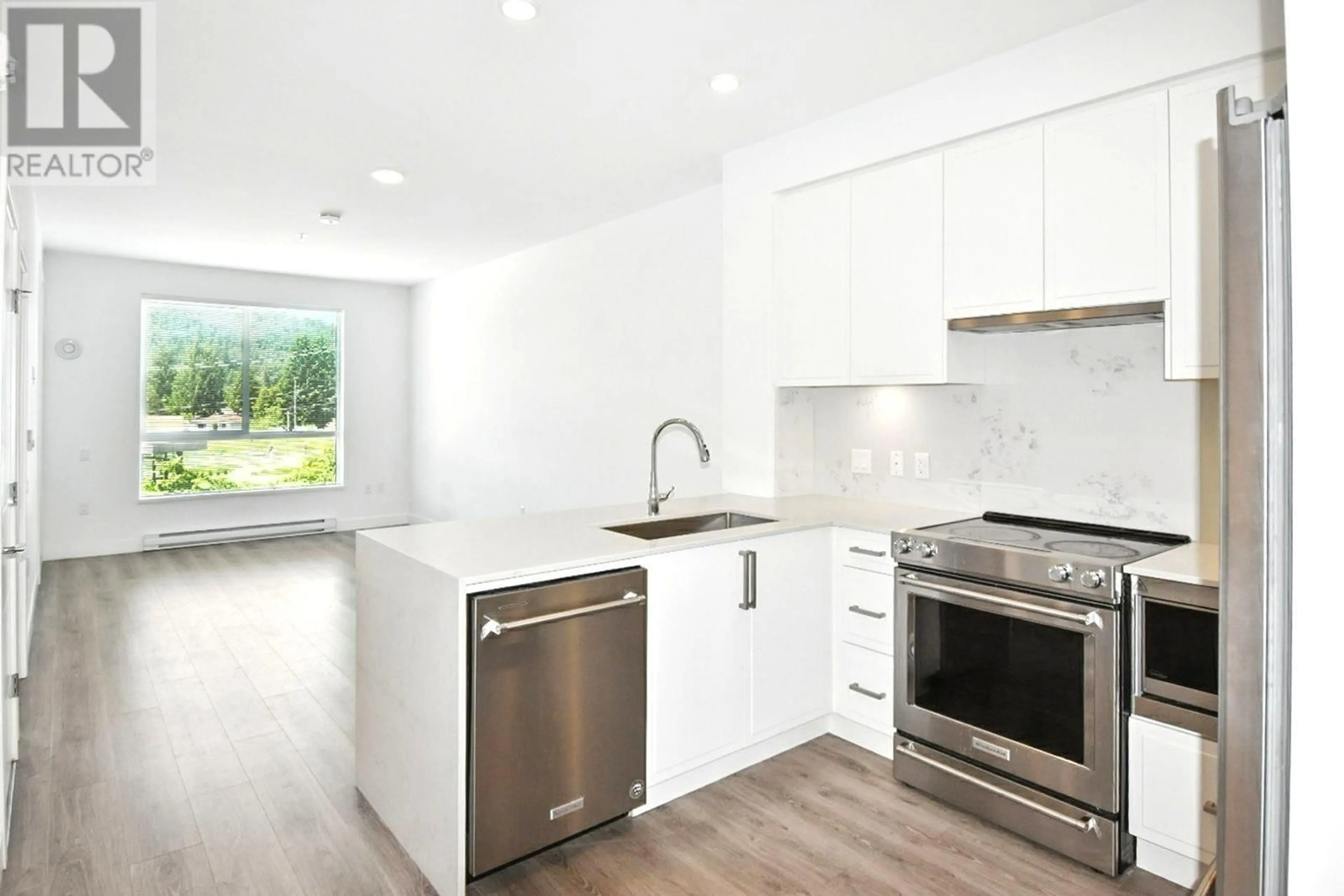 Open concept kitchen, unknown for 208 - 700 CLARKE ROAD, Coquitlam British Columbia V3J0K5
