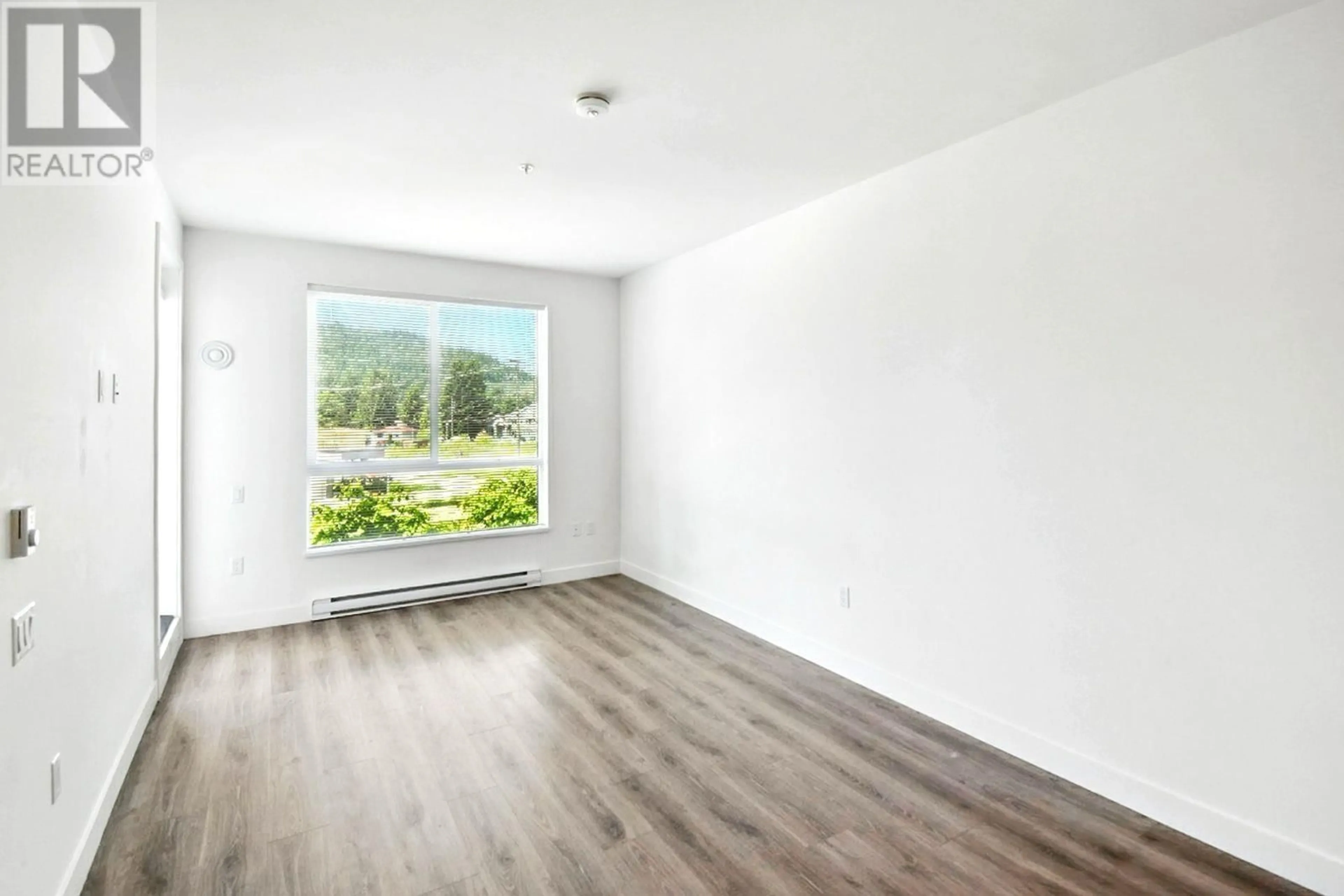 A pic of a room for 208 - 700 CLARKE ROAD, Coquitlam British Columbia V3J0K5