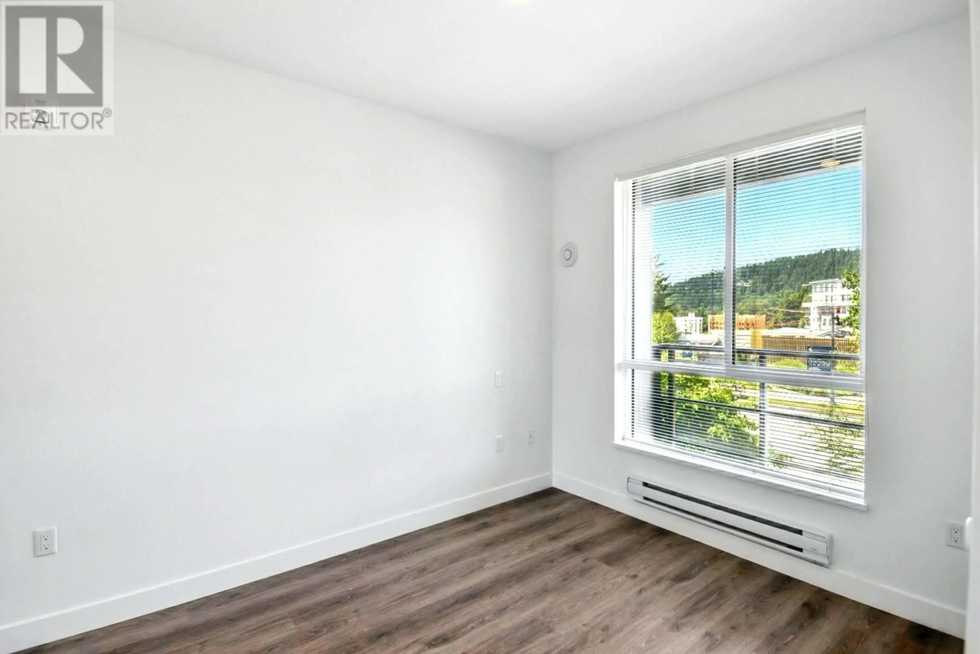 A pic of a room for 208 - 700 CLARKE ROAD, Coquitlam British Columbia V3J0K5
