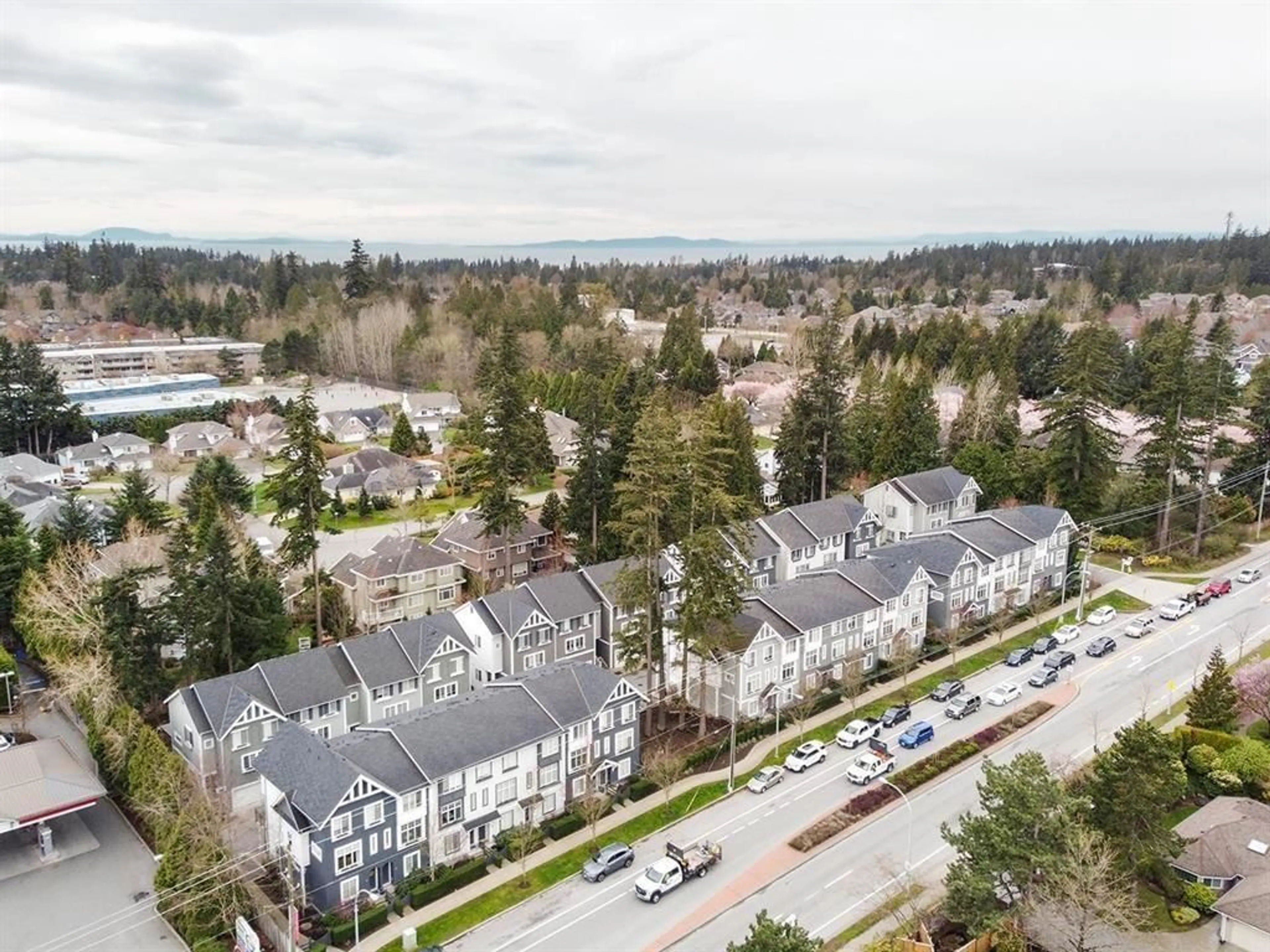 A pic from outside/outdoor area/front of a property/back of a property/a pic from drone, street for 24 - 15128 24, Surrey British Columbia V4A2H8
