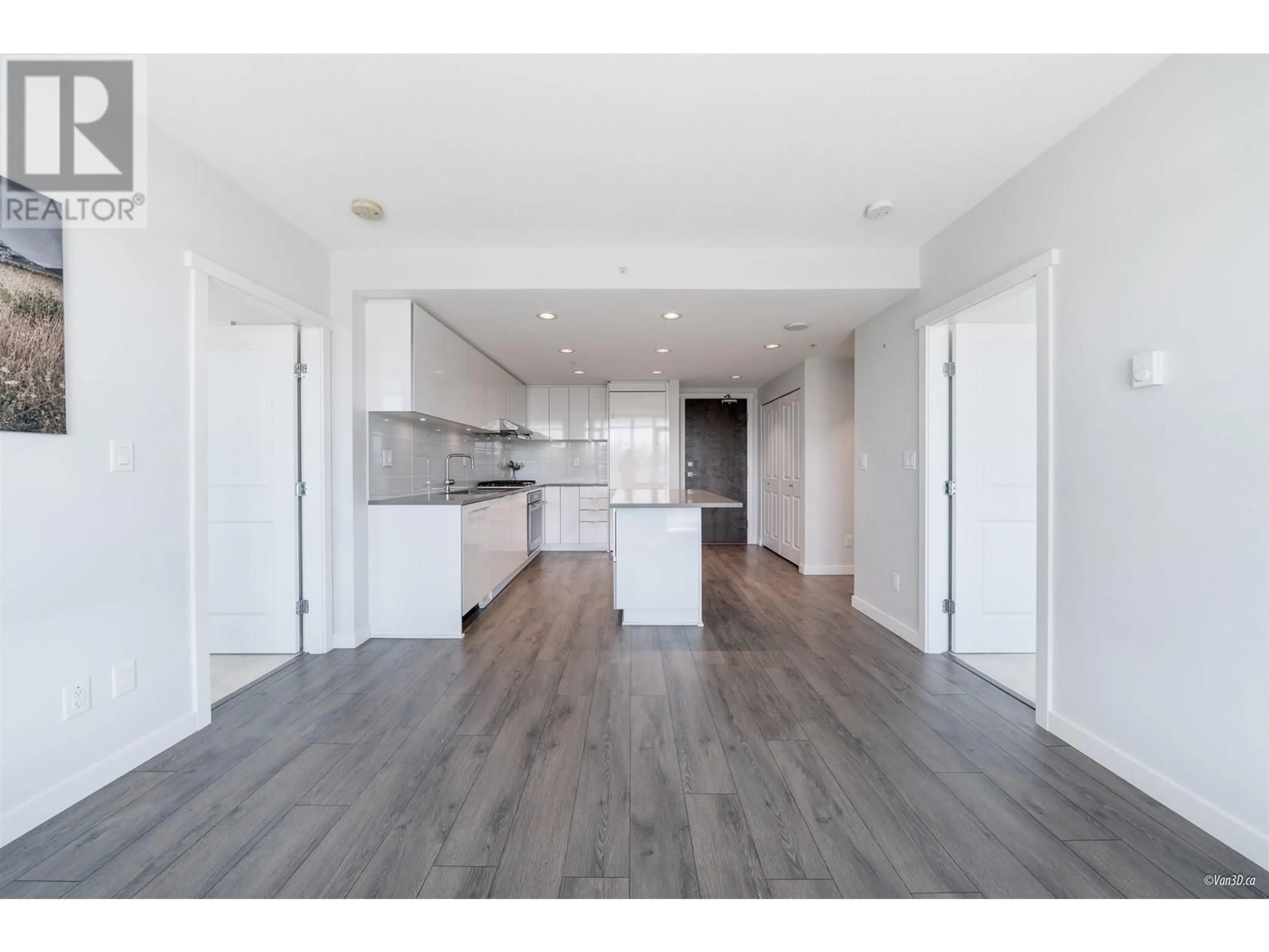 Open concept kitchen, wood/laminate floor for 1402 - 2388 MADISON AVENUE, Burnaby British Columbia V5C0K8