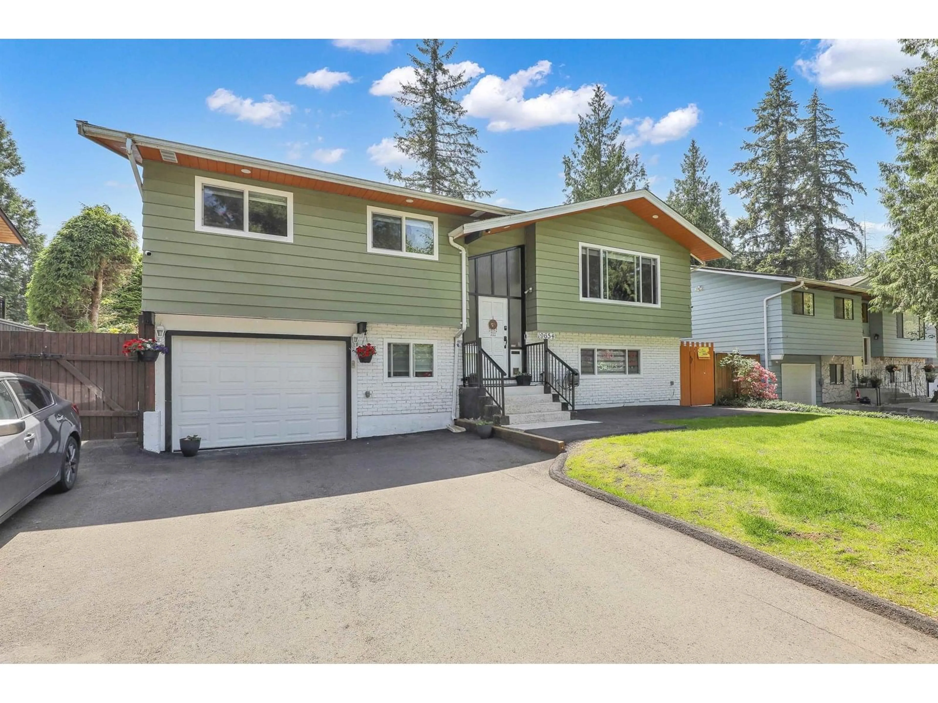Home with vinyl exterior material, street for 19654 47, Langley British Columbia V3A5G8