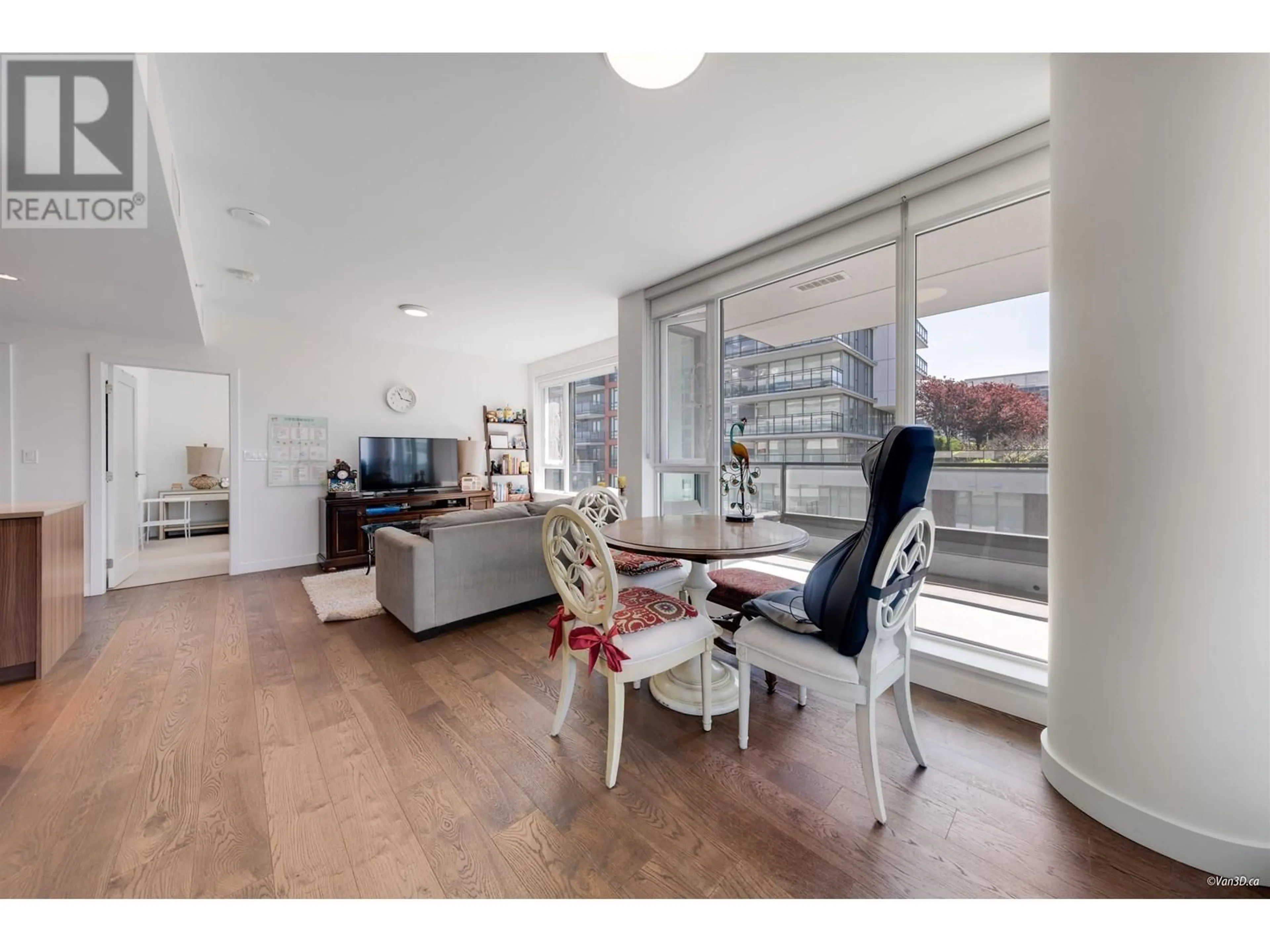 Living room with furniture, wood/laminate floor for 1009 - 8160 MCMYN WAY, Richmond British Columbia V6X0V2