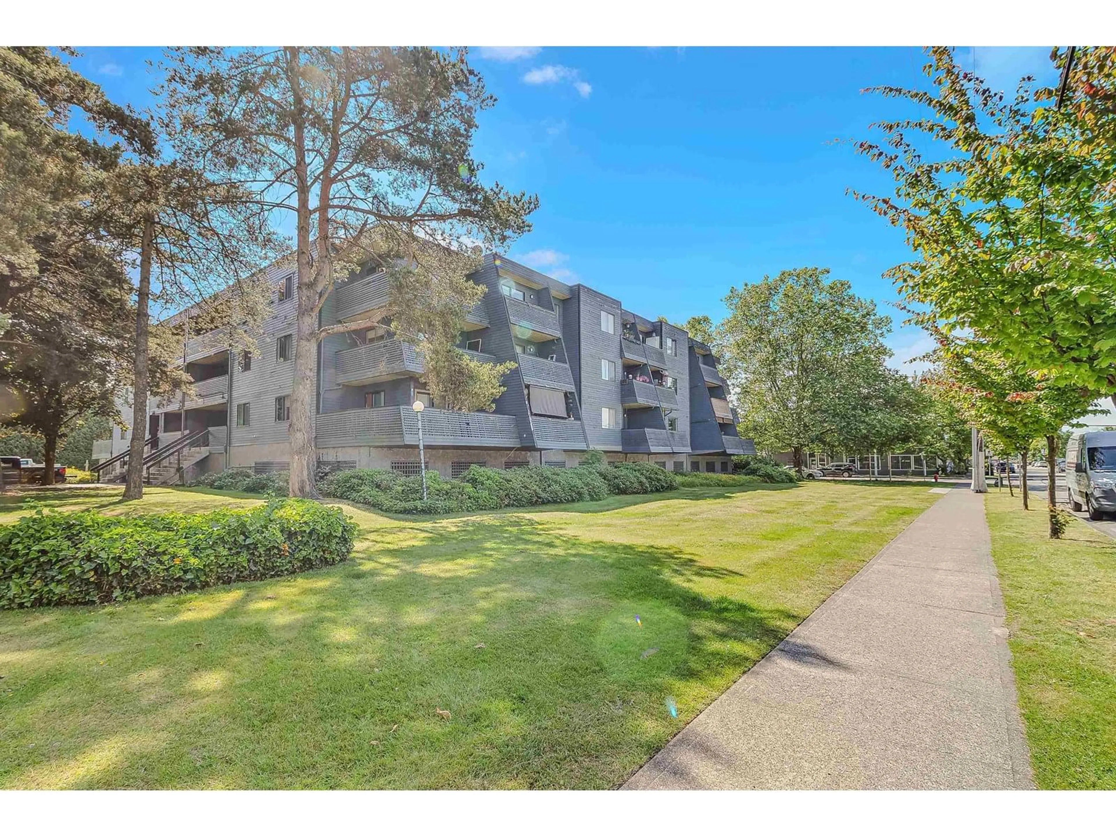A pic from outside/outdoor area/front of a property/back of a property/a pic from drone, unknown for 213 - 17661 58A, Surrey British Columbia V3S1N4