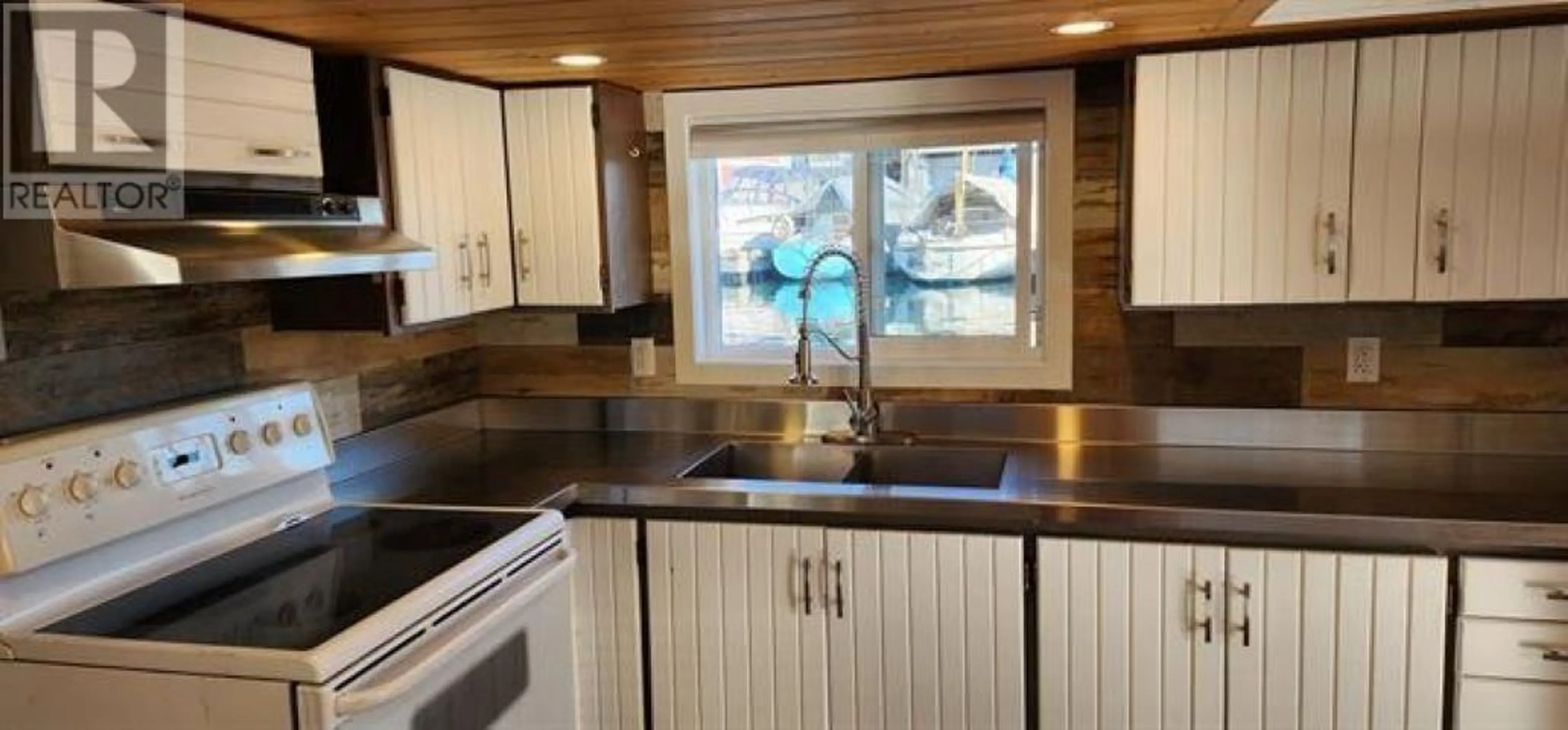 Open concept kitchen, unknown for 415 ESPLANADE AVENUE, North Vancouver British Columbia V7M1A4