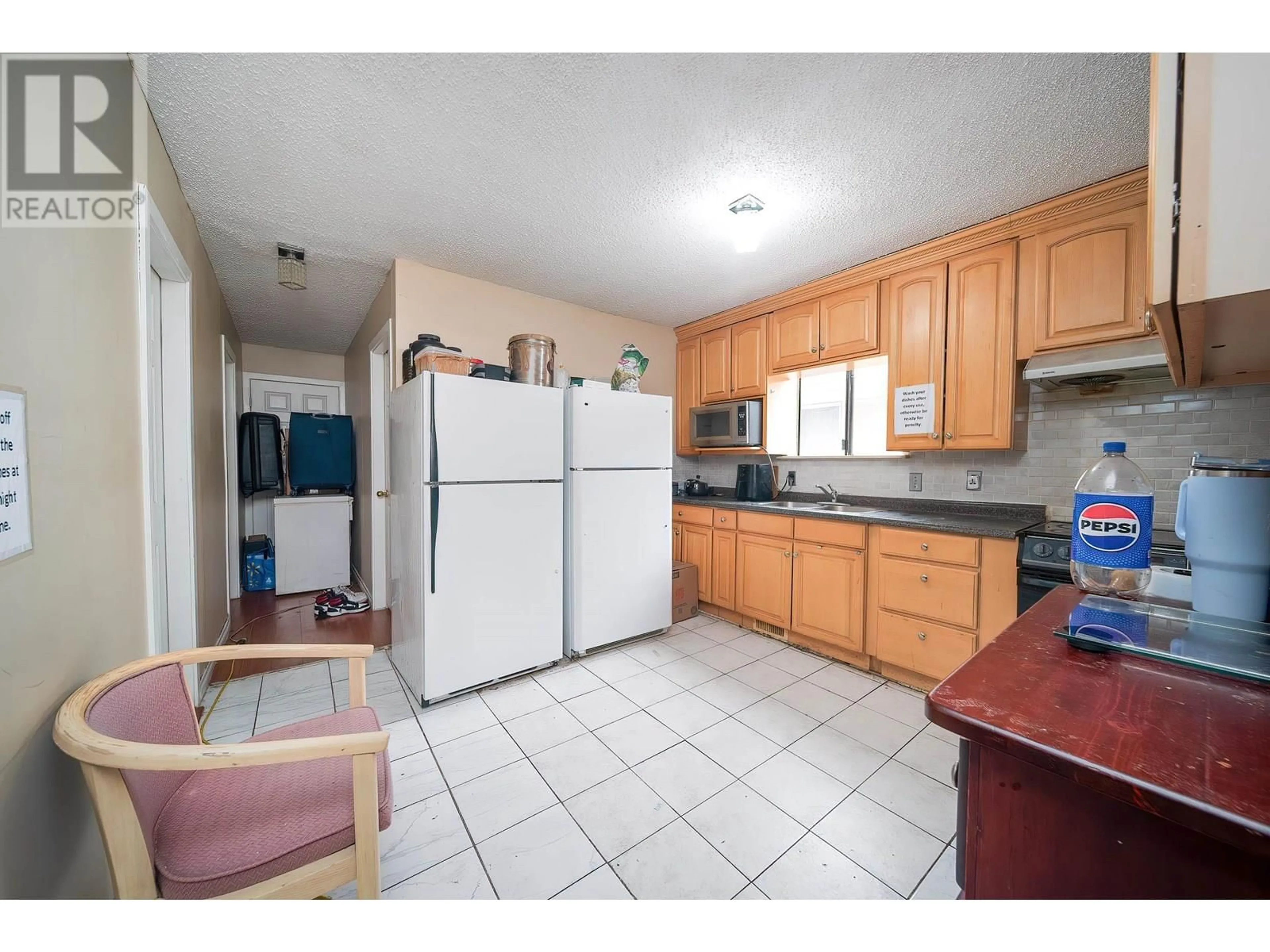 Standard kitchen, ceramic/tile floor for 4940 KILLARNEY STREET, Vancouver British Columbia V5R3V7