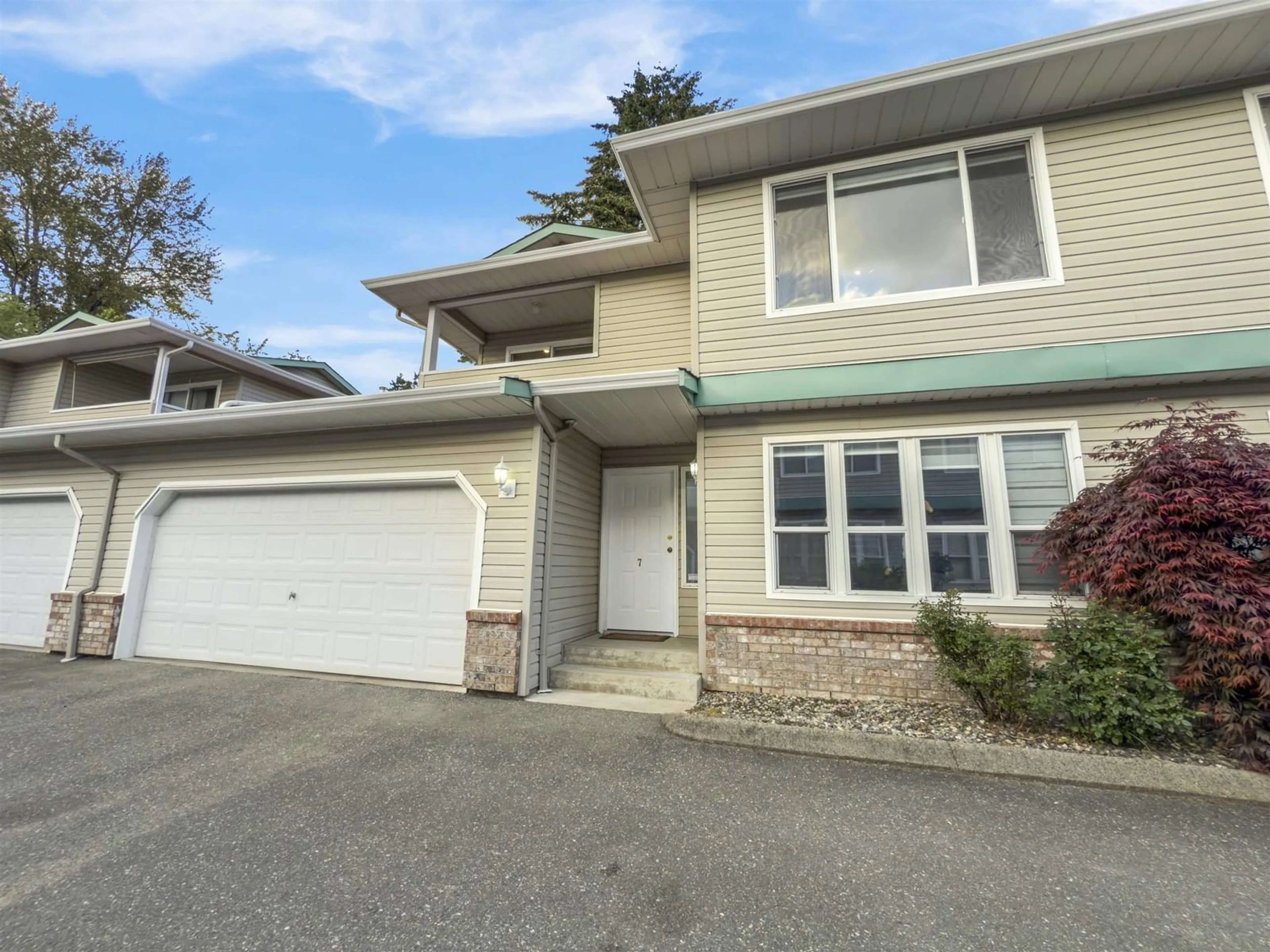 Home with vinyl exterior material, street for 7 - 46209 CESSNA DRIVE, Chilliwack British Columbia V2P1A7