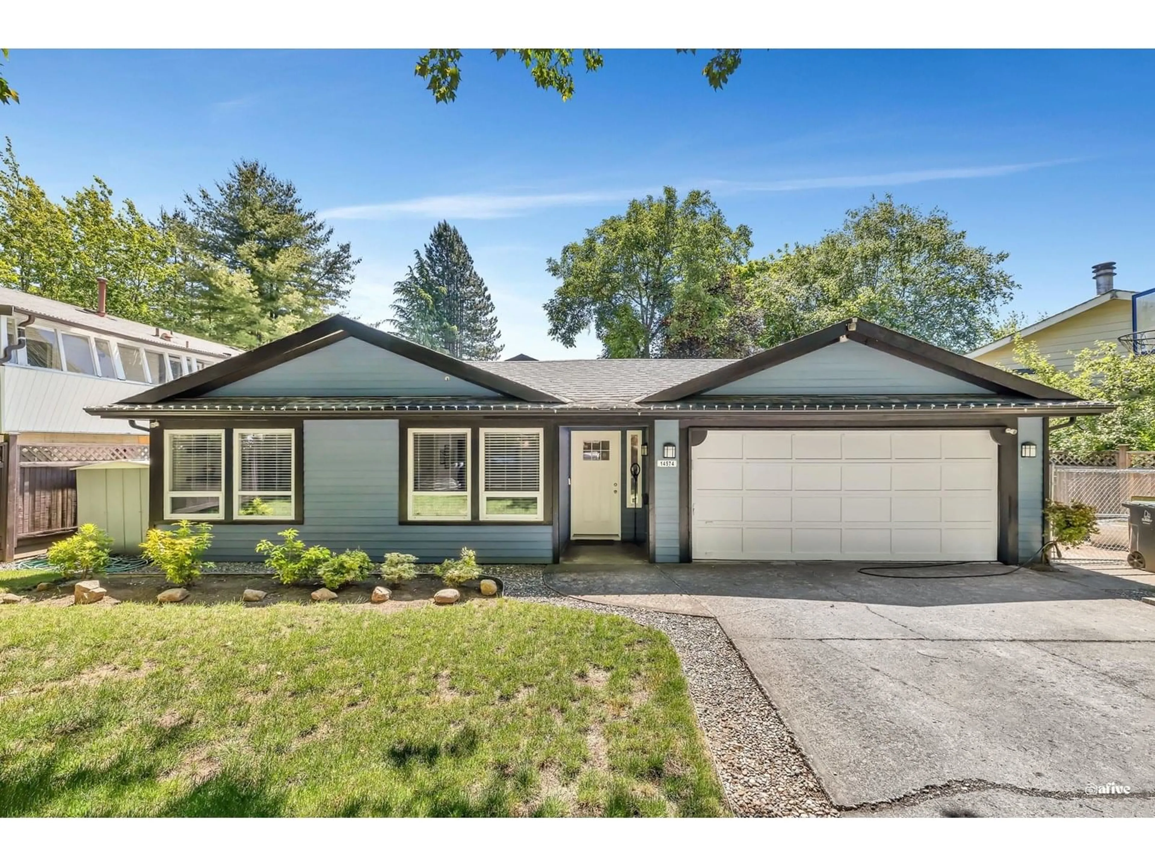 Home with vinyl exterior material, street for 14574 91A, Surrey British Columbia V3R7K8