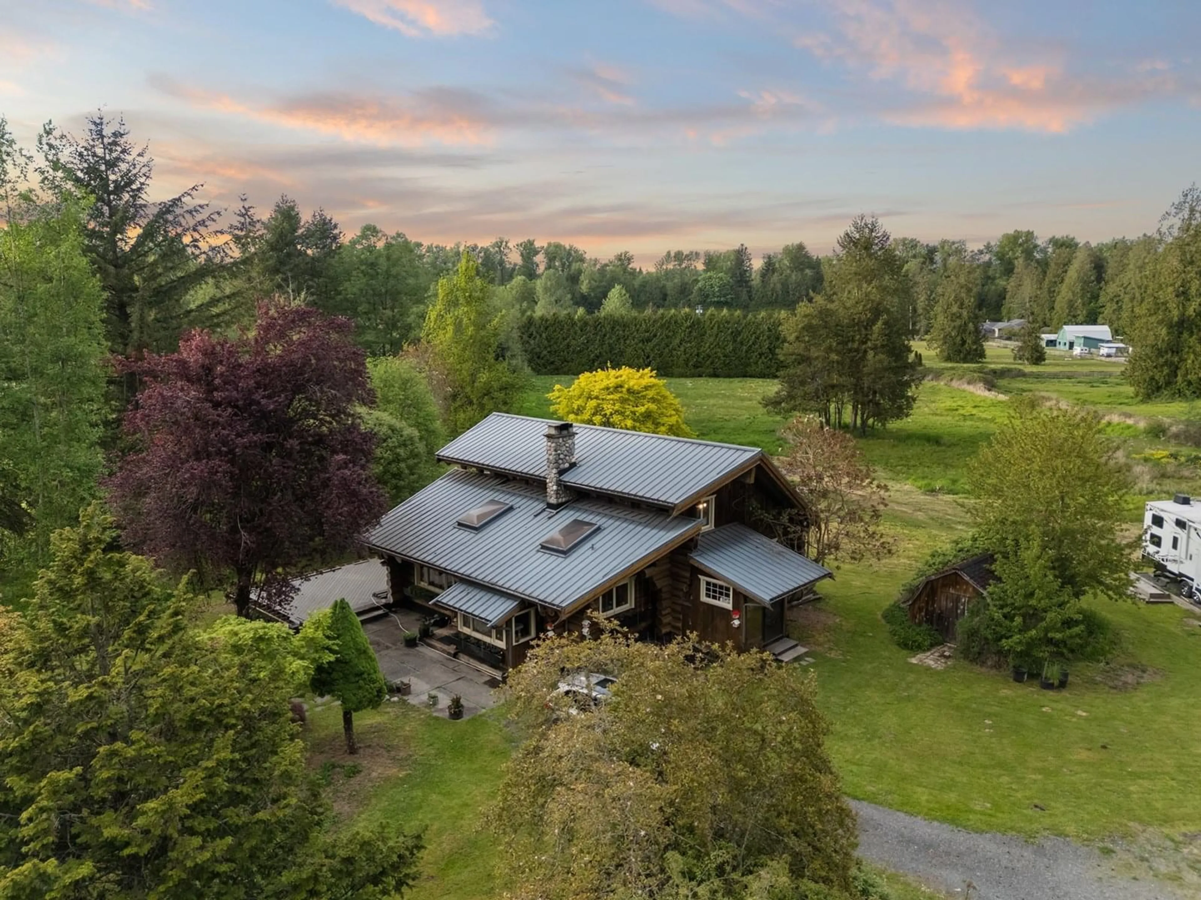 A pic from outside/outdoor area/front of a property/back of a property/a pic from drone, unknown for 21411 2, Langley British Columbia V3A2V3