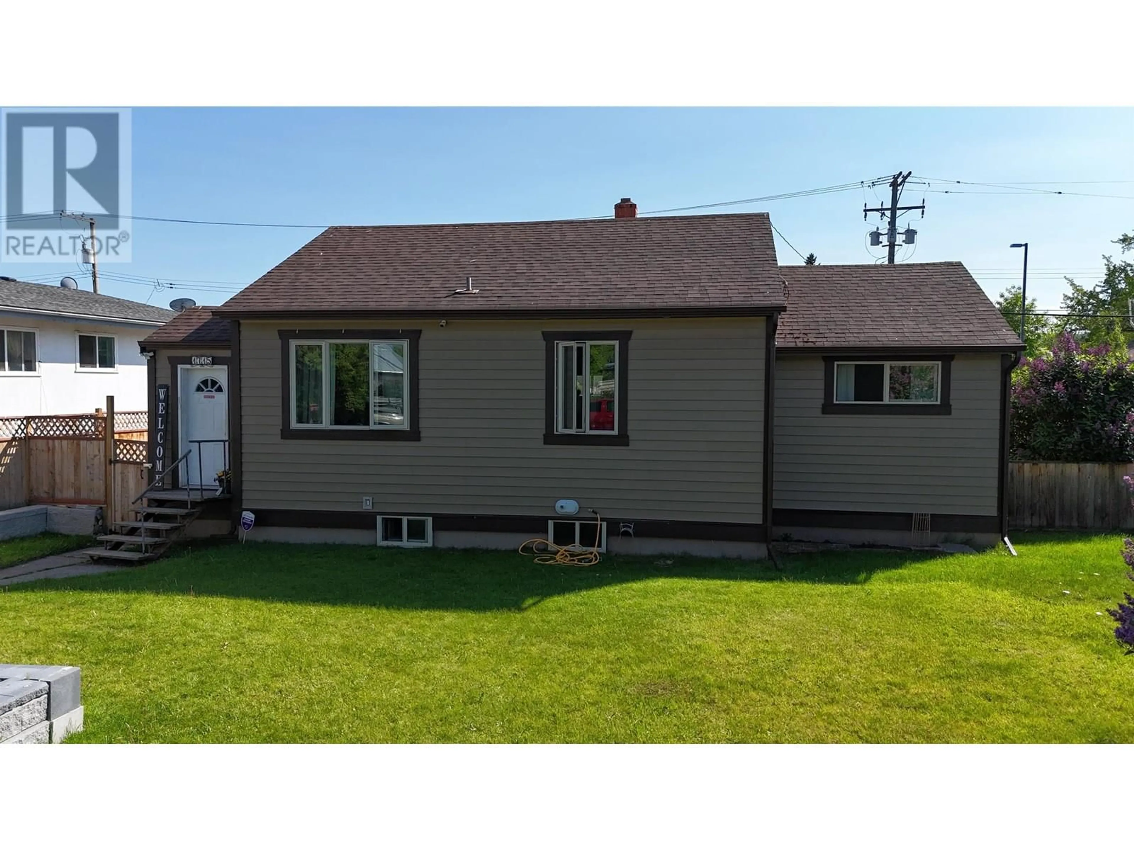 Home with vinyl exterior material, street for 1715 9TH AVENUE, Prince George British Columbia V2L3R9