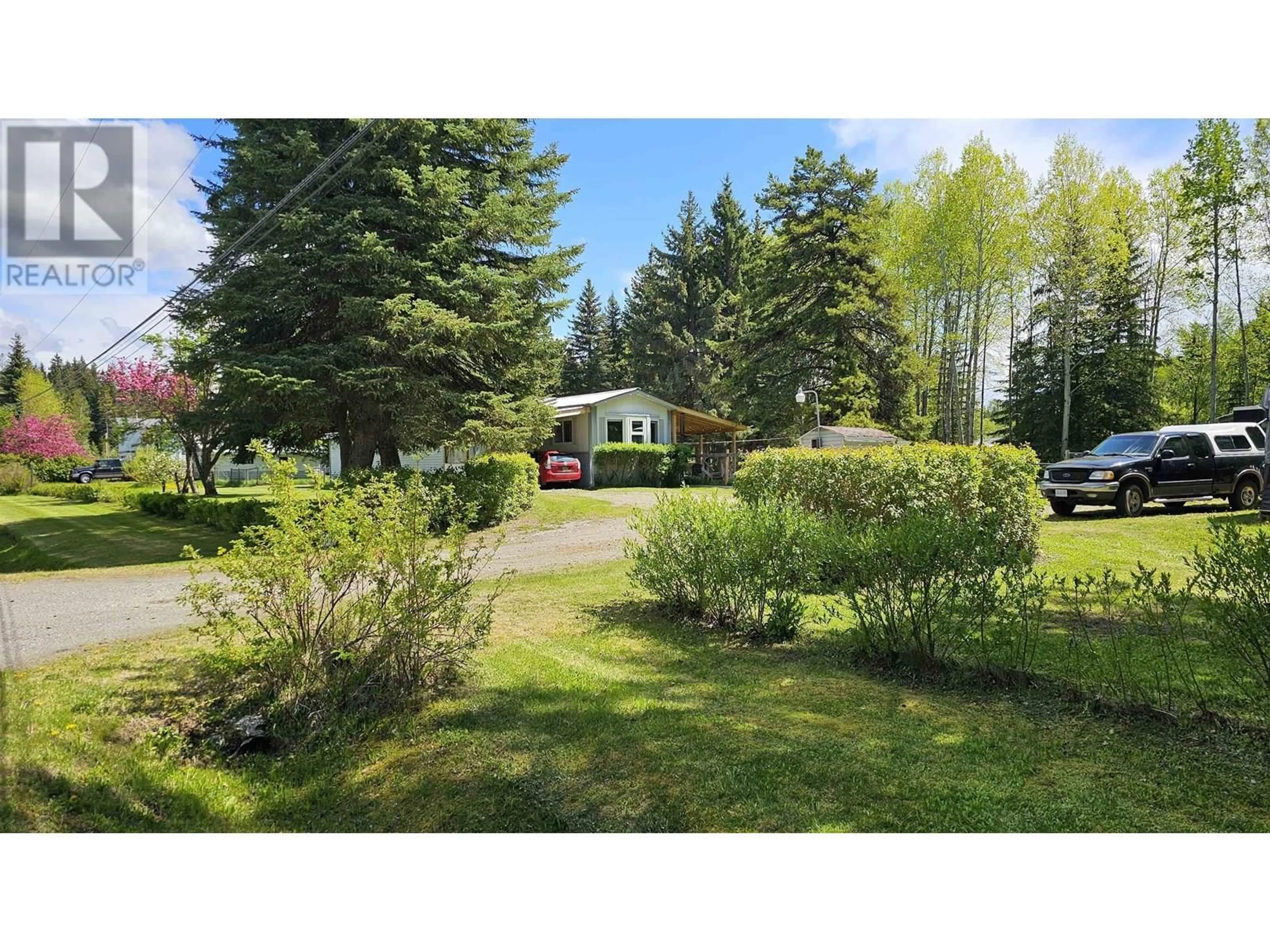 A pic from outside/outdoor area/front of a property/back of a property/a pic from drone, forest/trees view for 718 FUTURE DRIVE, Quesnel British Columbia V2J6W1
