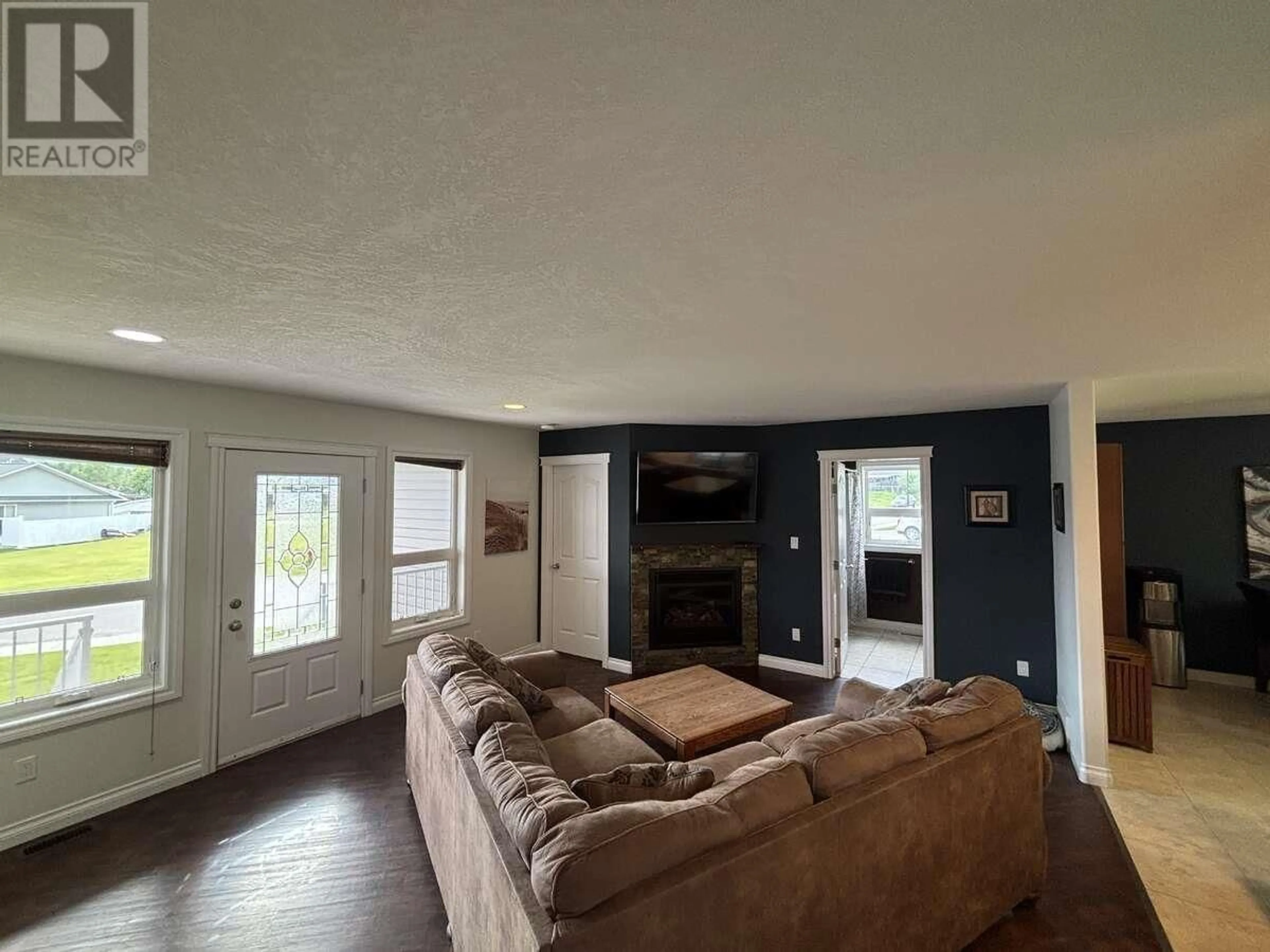 Living room with furniture, unknown for 211 NICKEL RIDGE AVENUE, Quesnel British Columbia V2J6P6