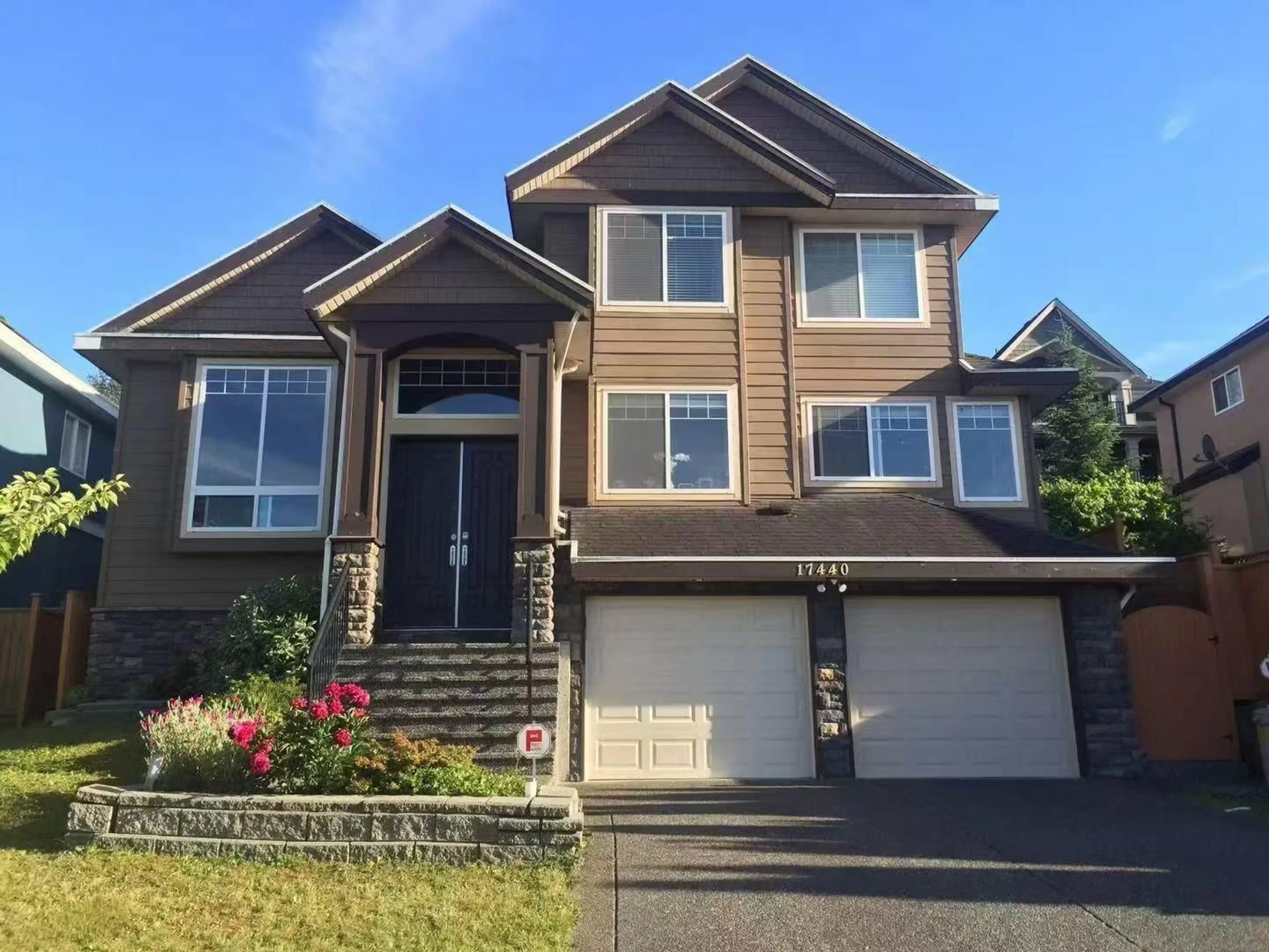 Home with vinyl exterior material, street for 17440 103B, Surrey British Columbia V4N5R4