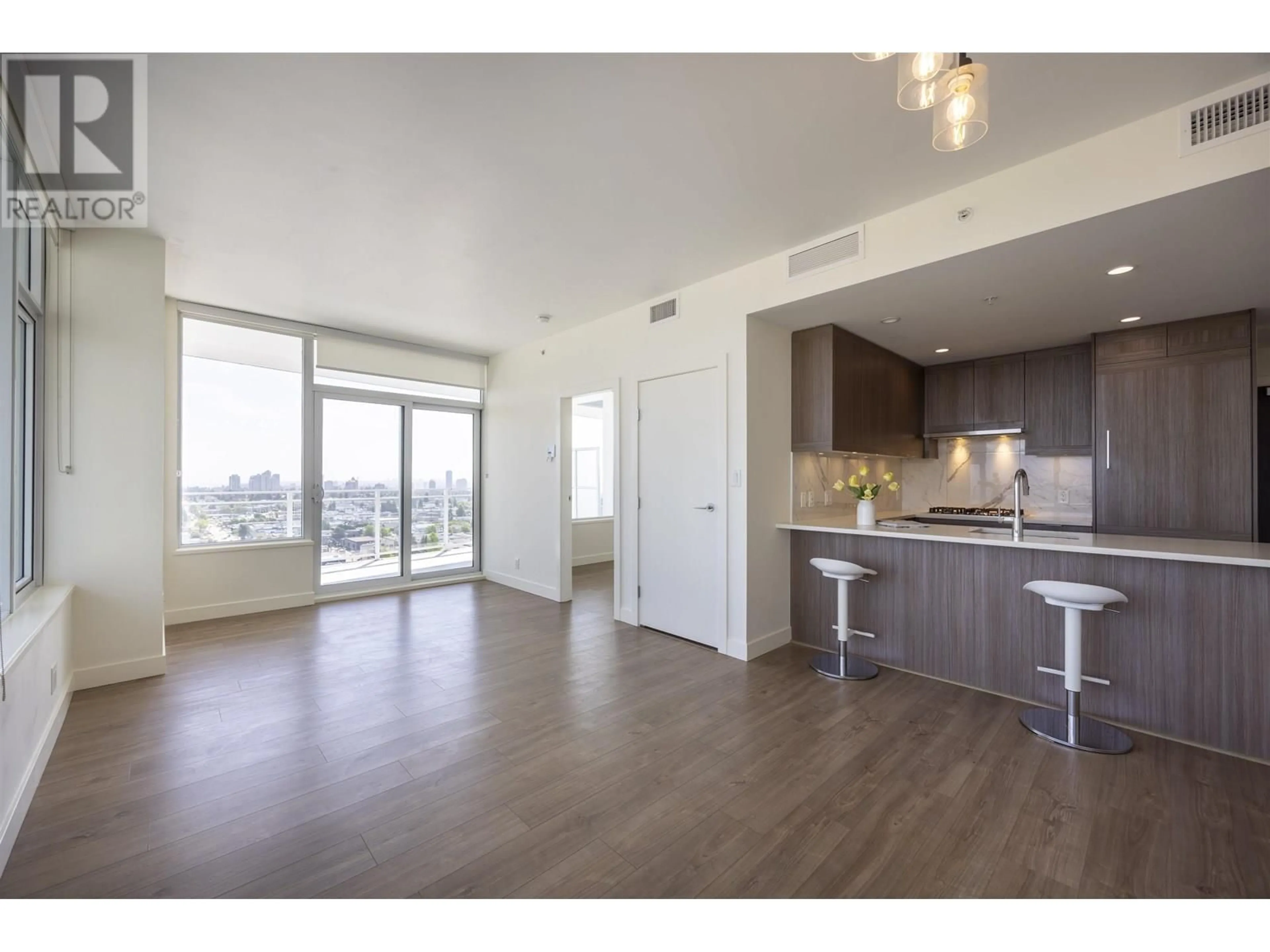 Open concept kitchen, wood/laminate floor for 2102 - 5051 IMPERIAL STREET, Burnaby British Columbia V5J0J3
